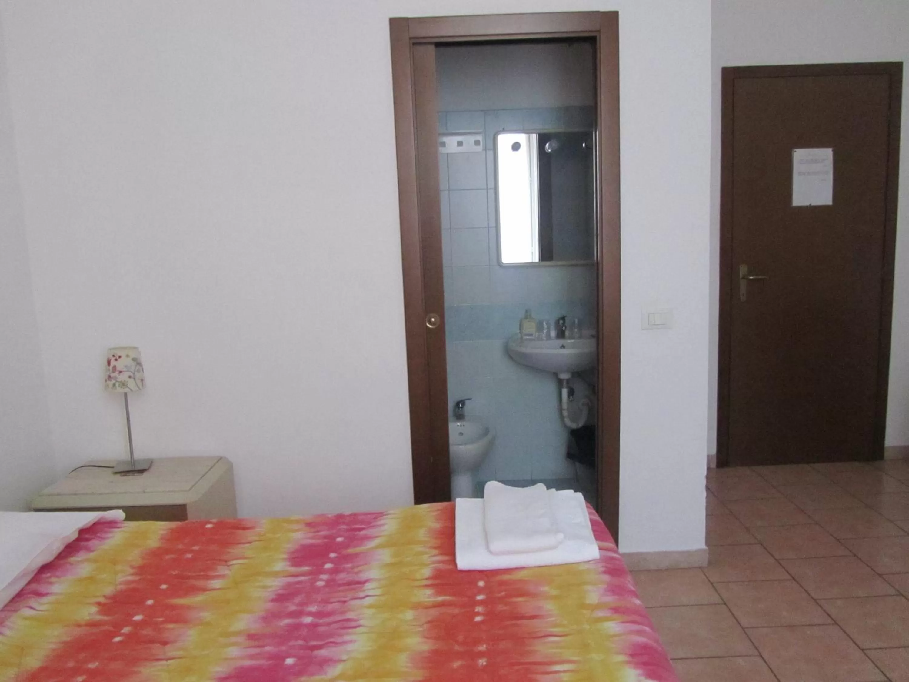 Bed in Hotel Gambara