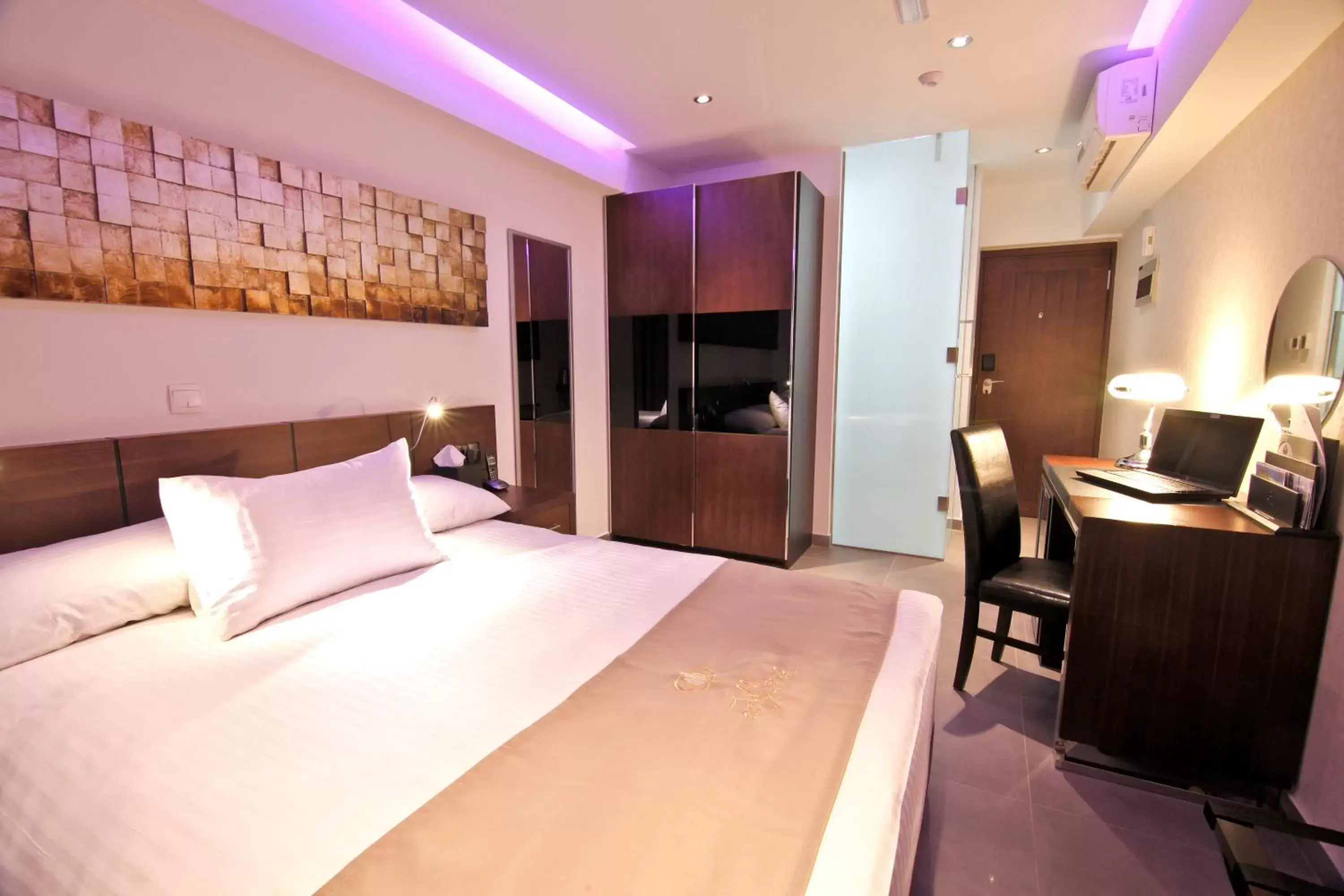 Bed in Achilleos City Hotel