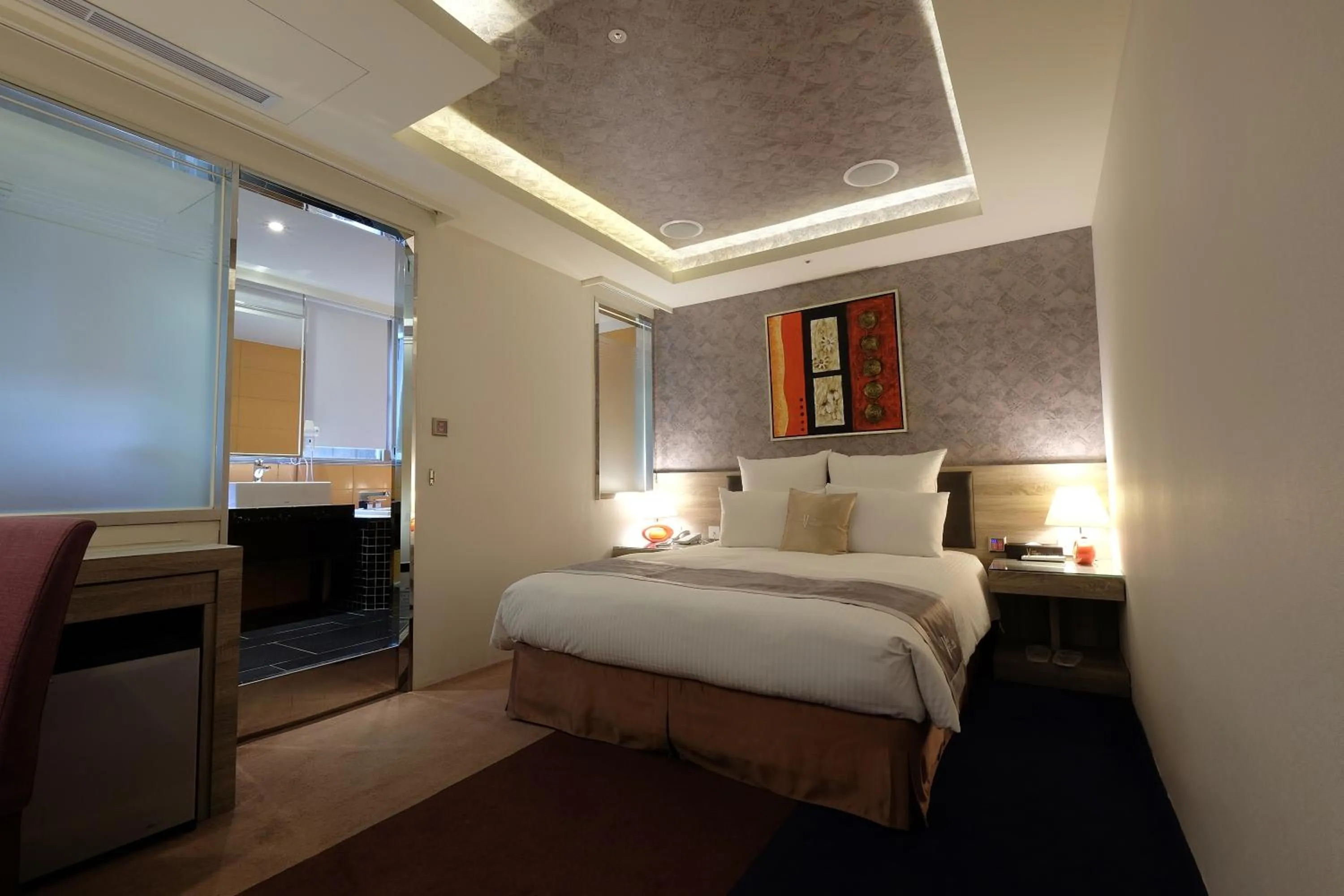 Photo of the whole room, Bed in V-one Vogue Hotel