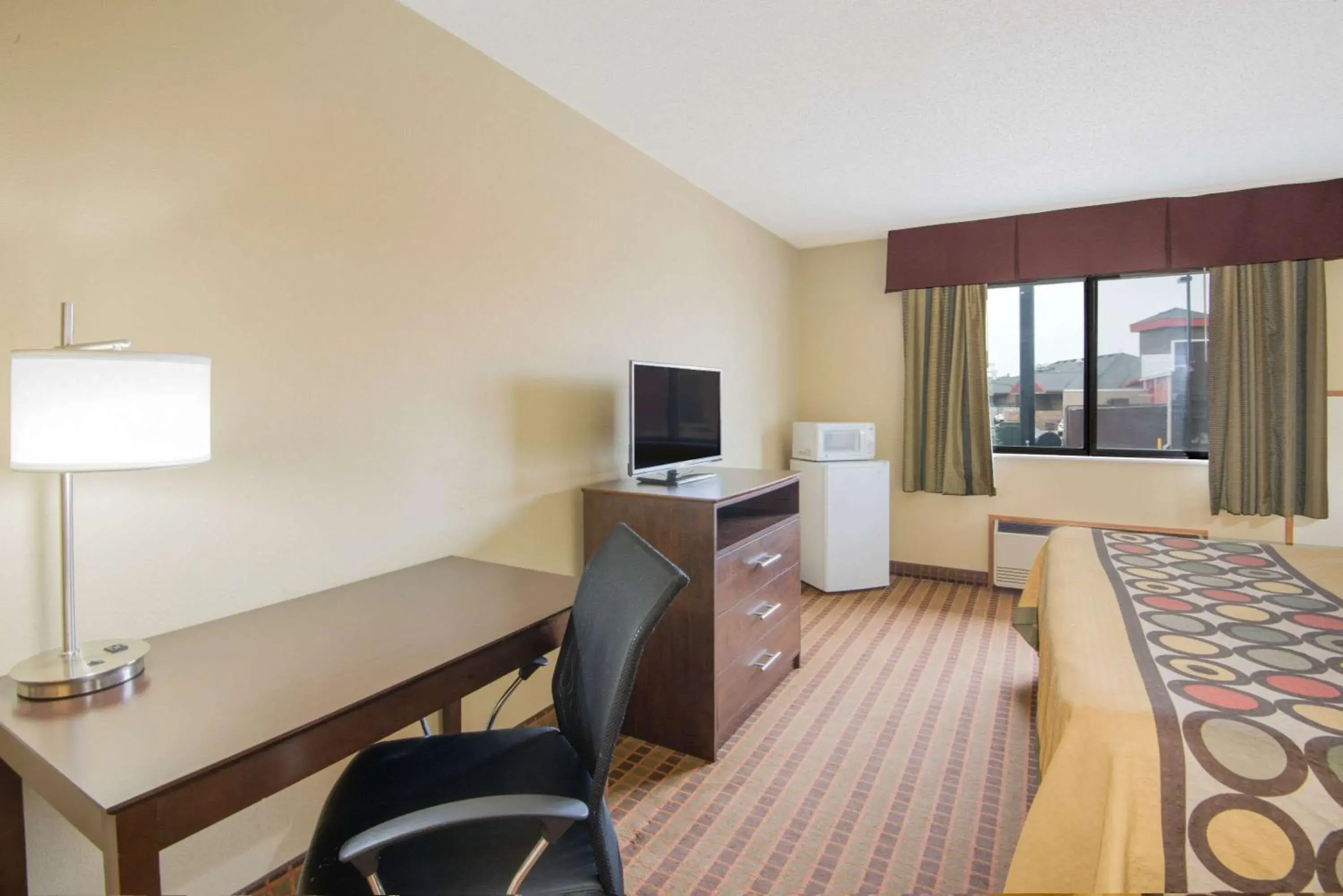 Photo of the whole room, TV/Entertainment Center in Super 8 by Wyndham Story City