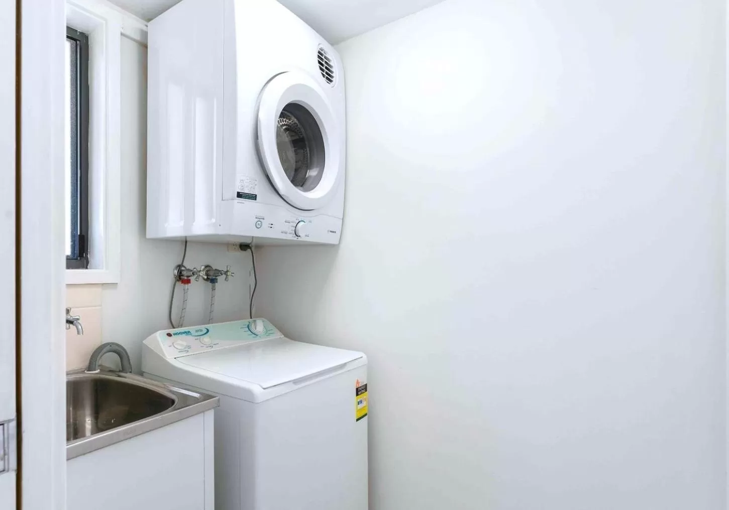 washing machine in Stay At Raffertys Resort