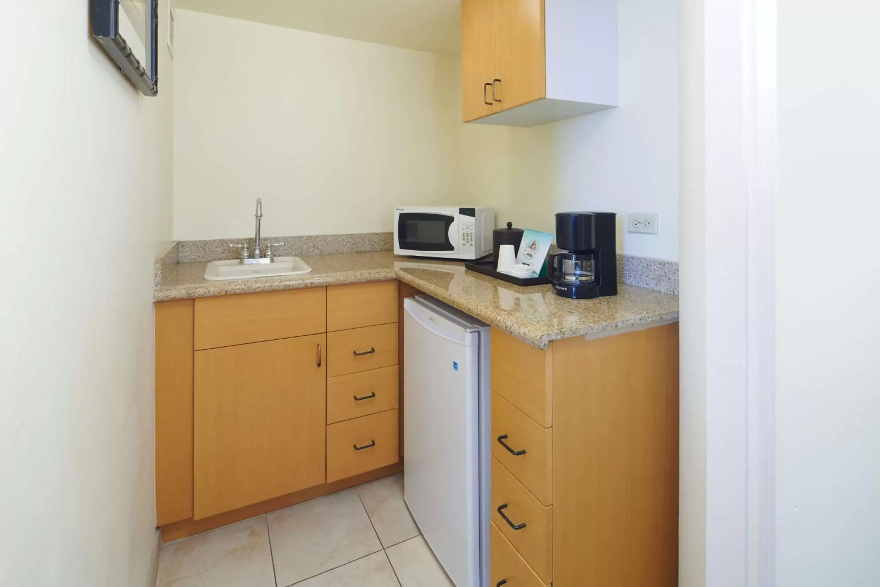 Kitchen or kitchenette, Kitchen/Kitchenette in OHANA Waikiki East by OUTRIGGER