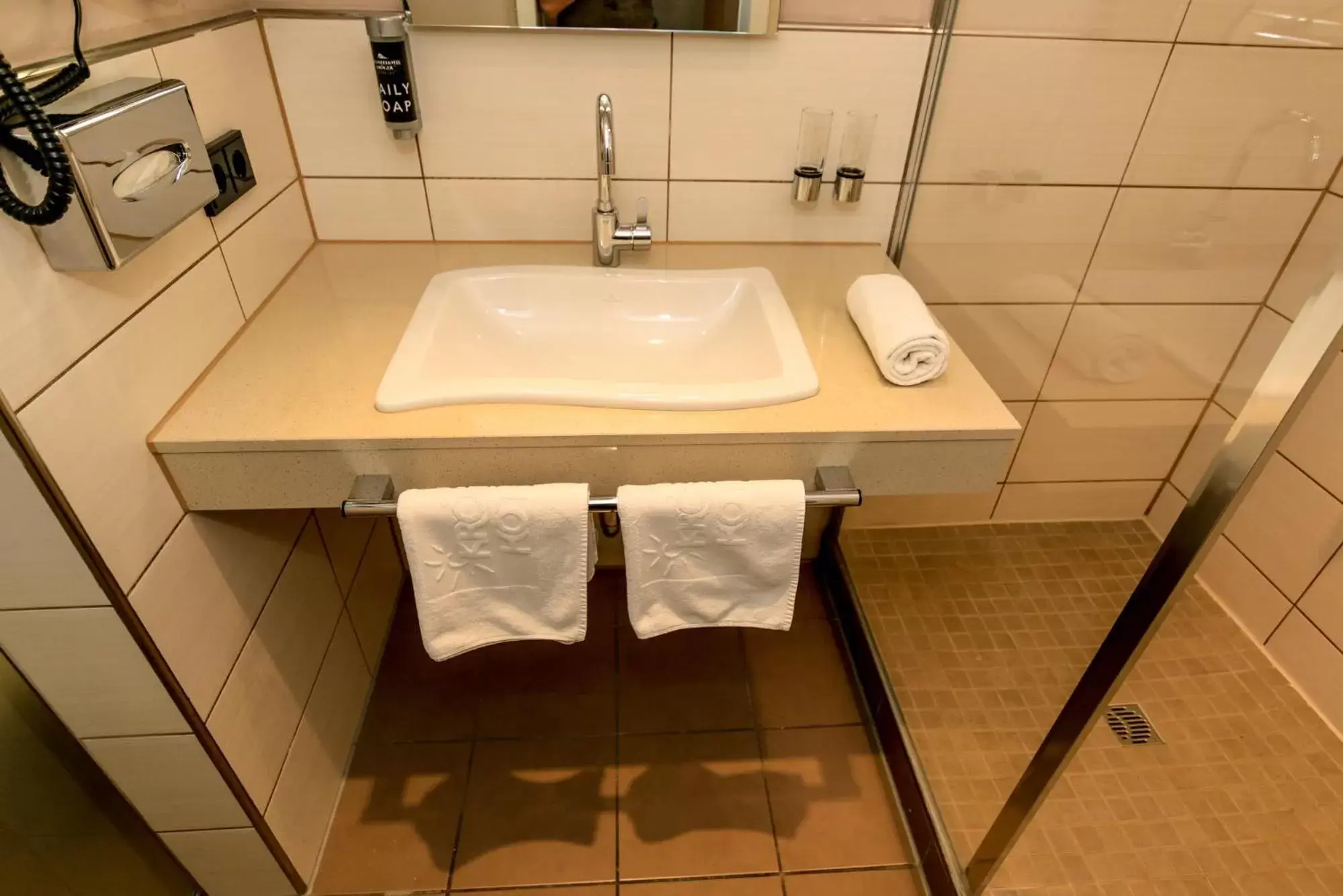 Bathroom in Nordseehotel Kröger