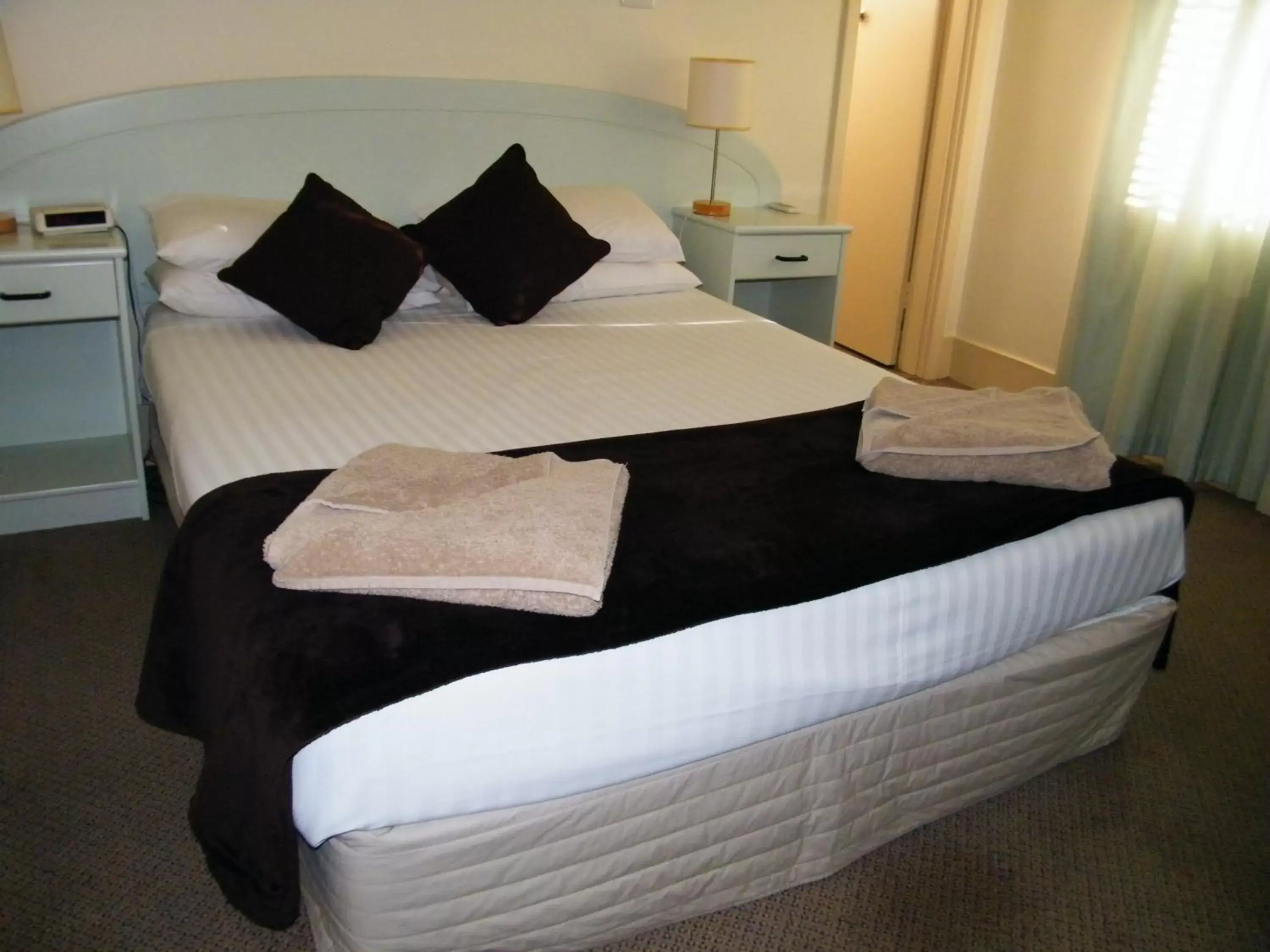 Bed in Grand Tasman Hotel