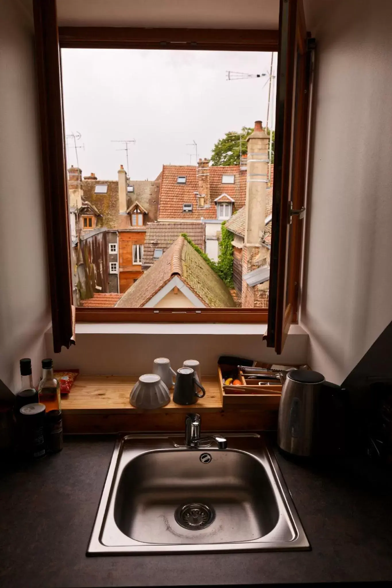 Kitchen/Kitchenette in Appart'Hôtel Sainte Trinité