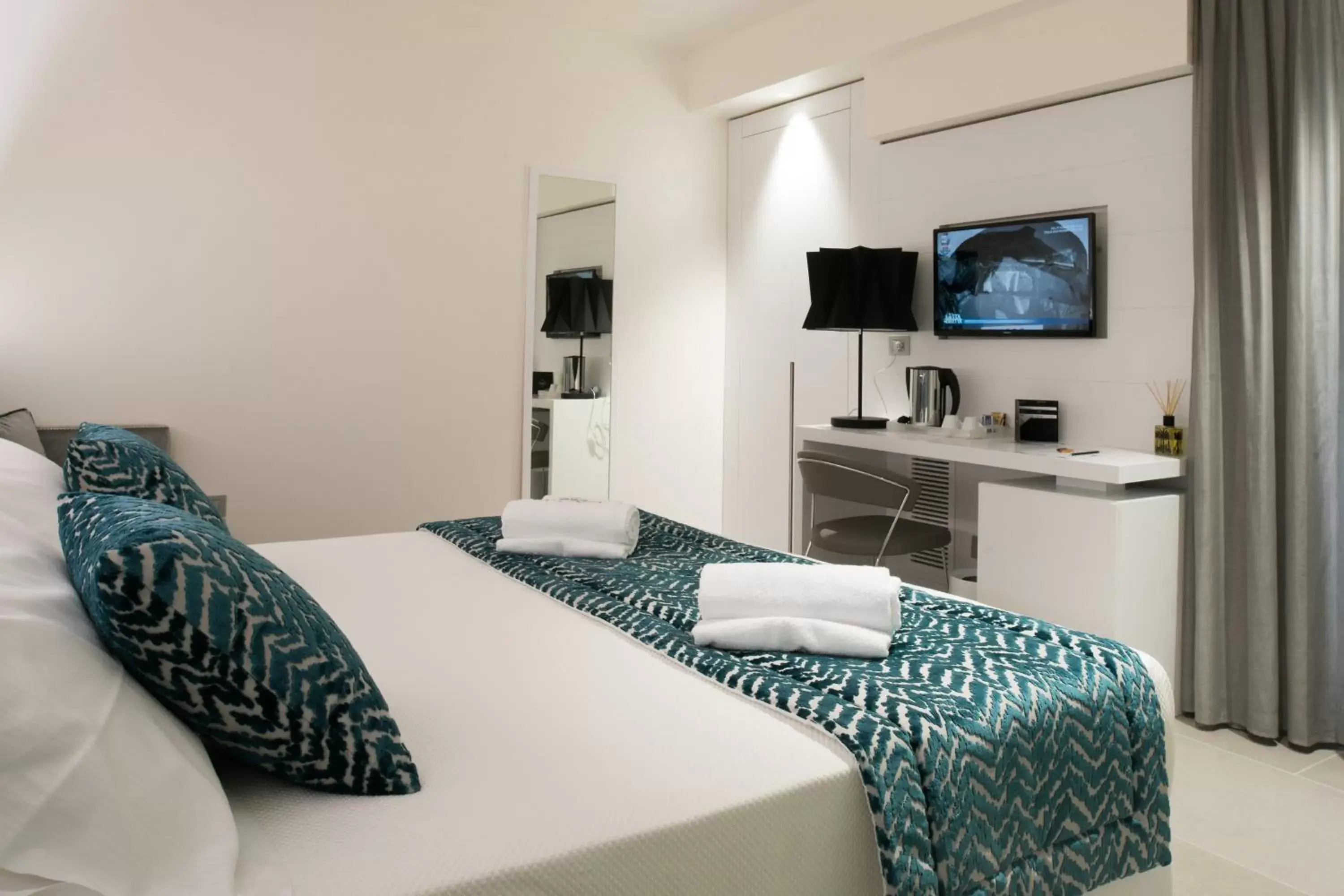 Bed in Caportigia Boutique Hotel