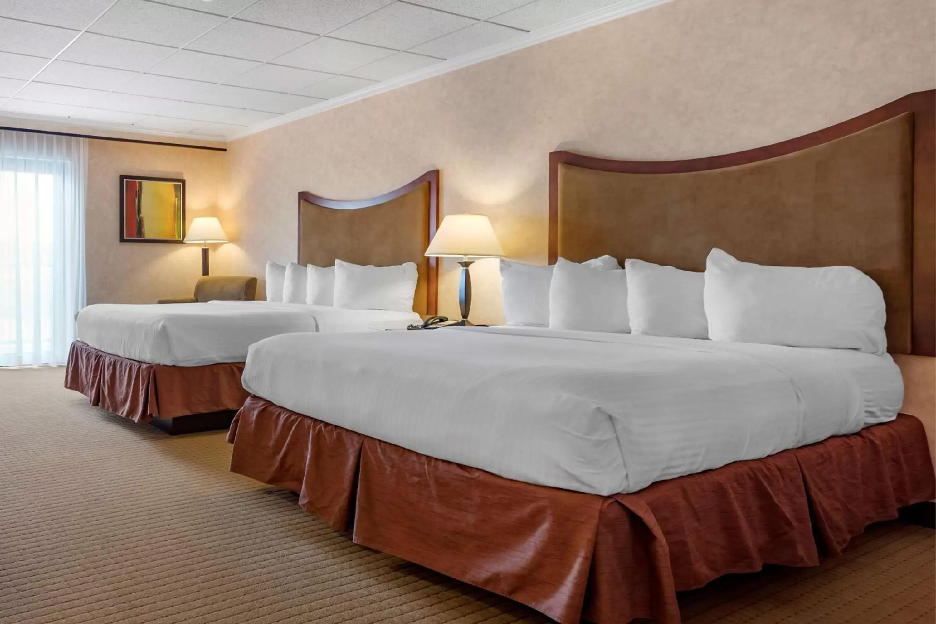 Bed in Best Western Plus Oswego Hotel and Conference Center