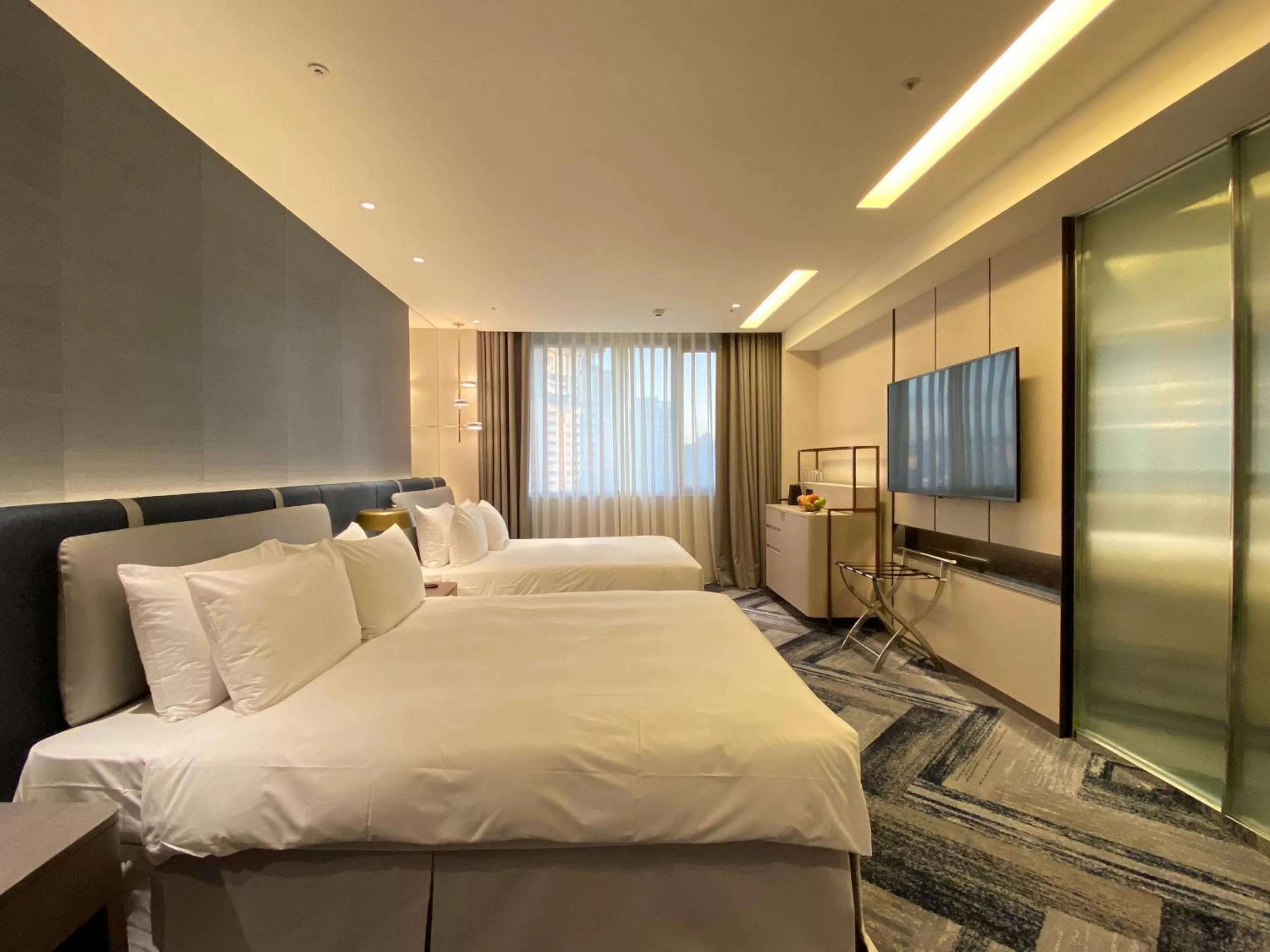 Deluxe Quadruple Room in Monarch Plaza Hotel