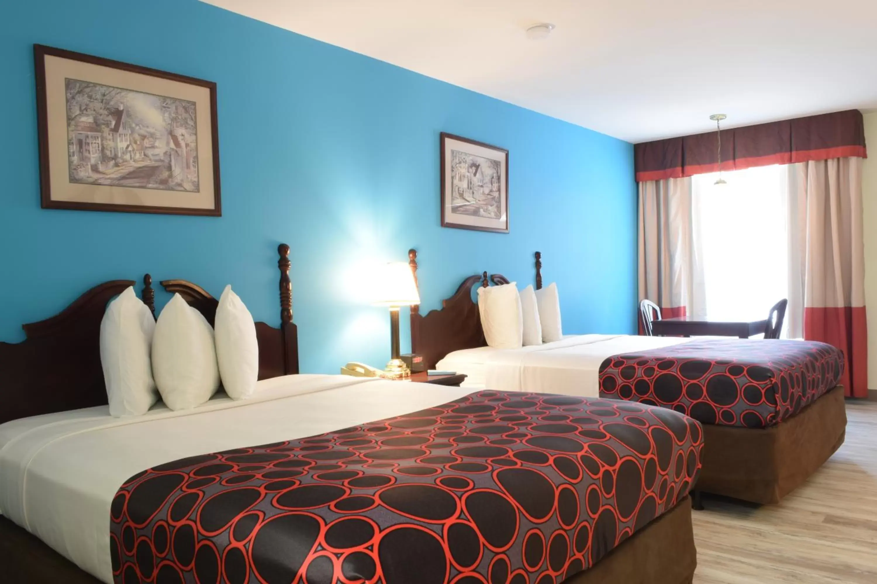 Bed in Hilltop Inn & Suites - North Stonington