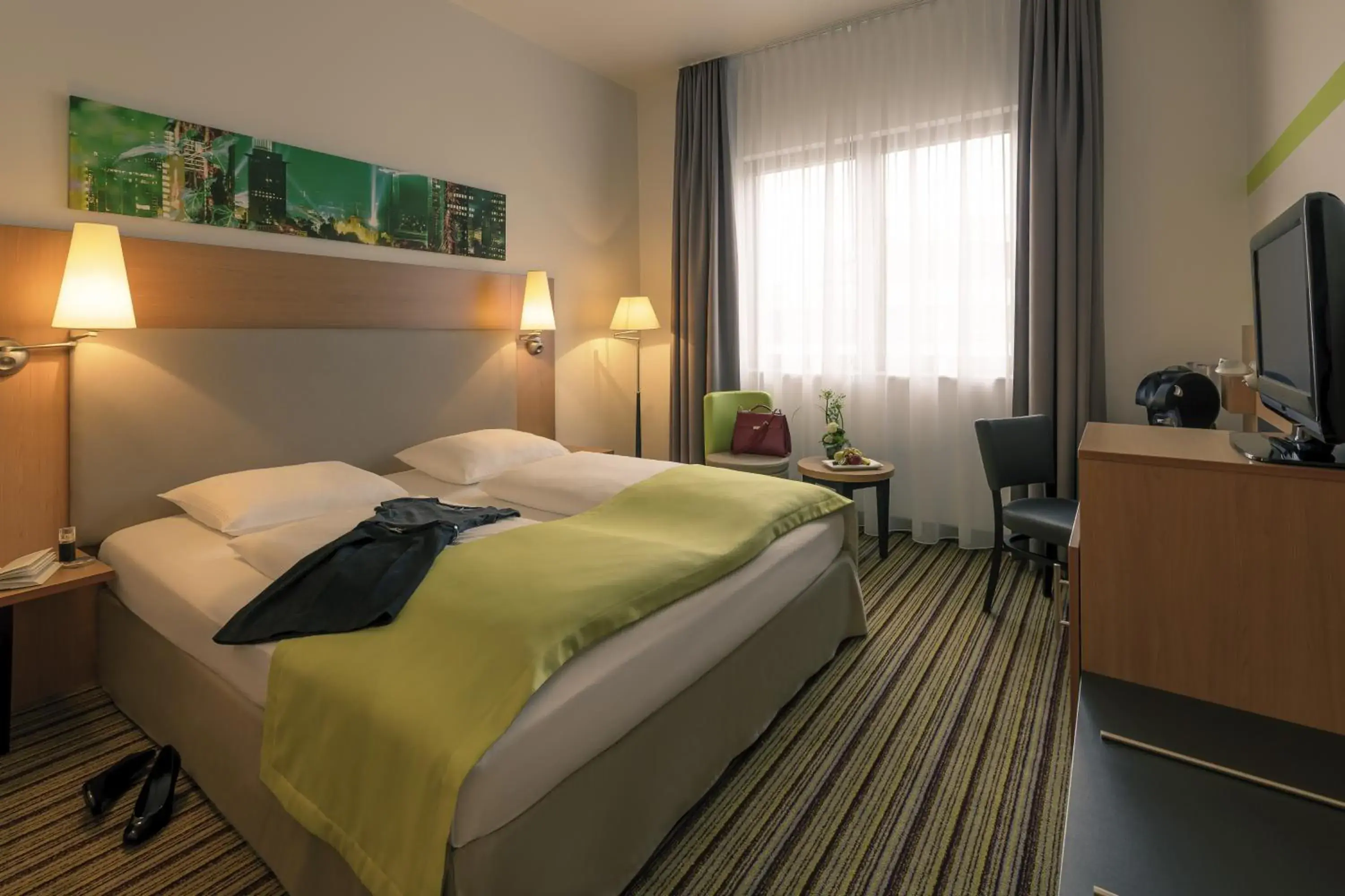 Photo of the whole room, Bed in Mercure Hotel Frankfurt Eschborn Süd