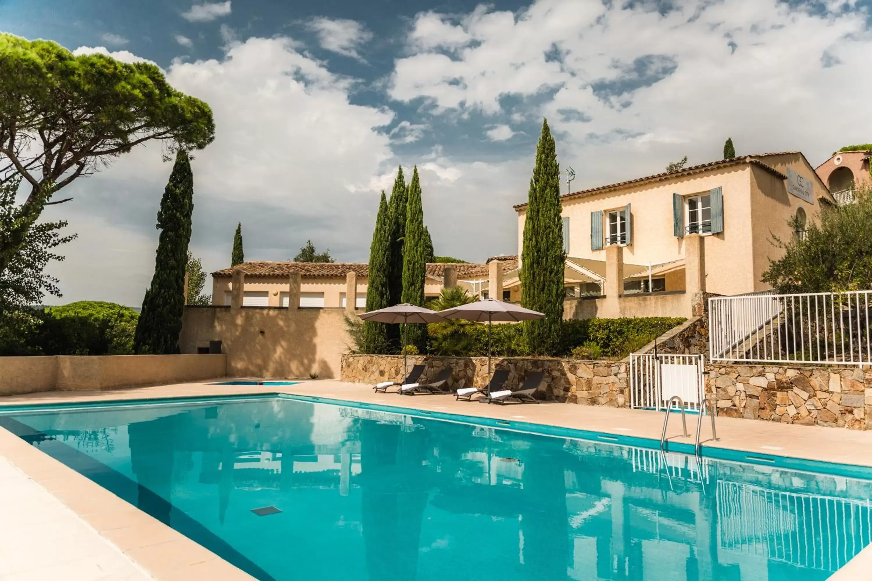 Swimming Pool in Garden & City Les Bastides de Grimaud