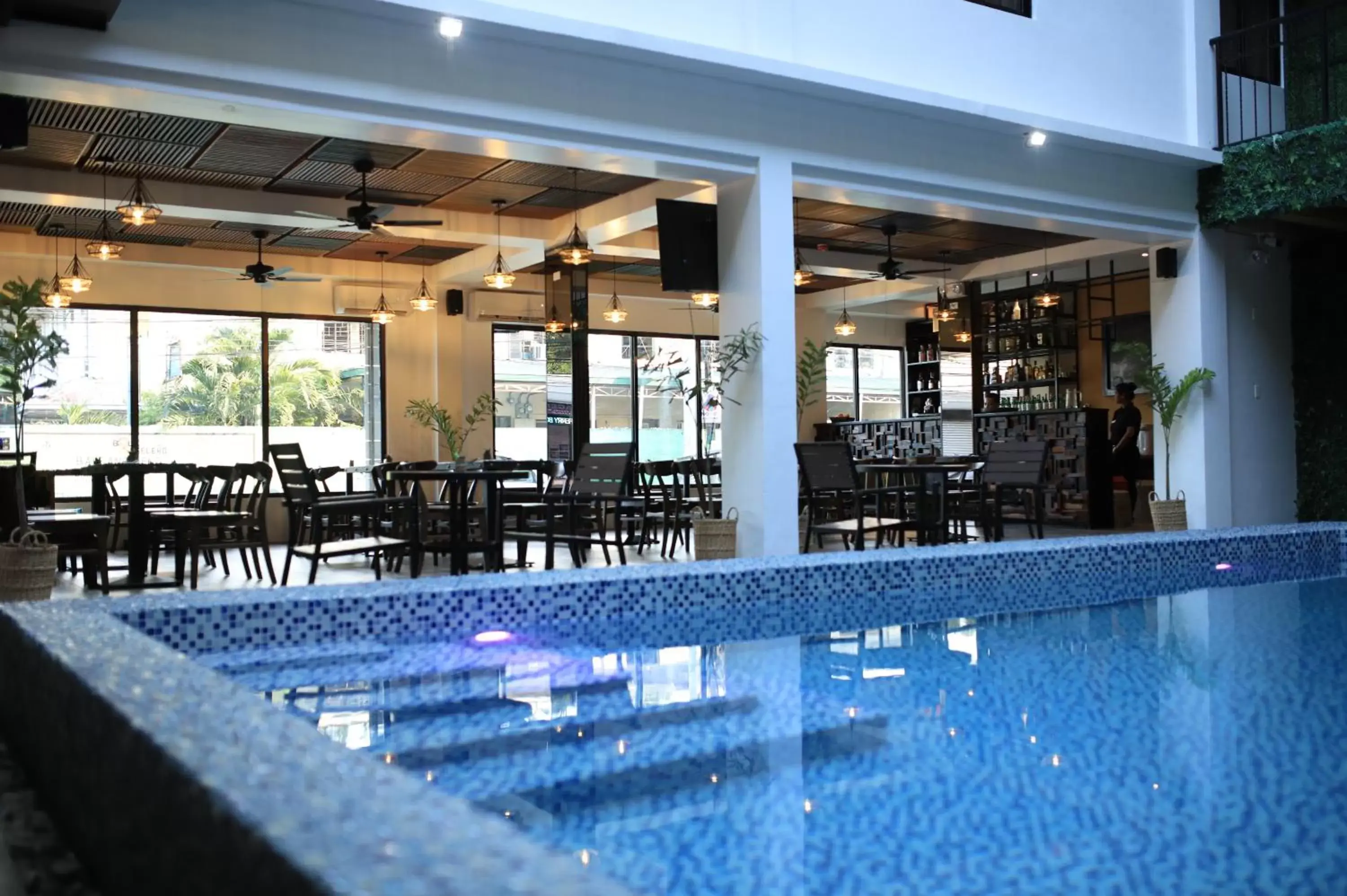 Swimming Pool in SureStay Plus Hotel by Best Western AC LUXE Angeles City