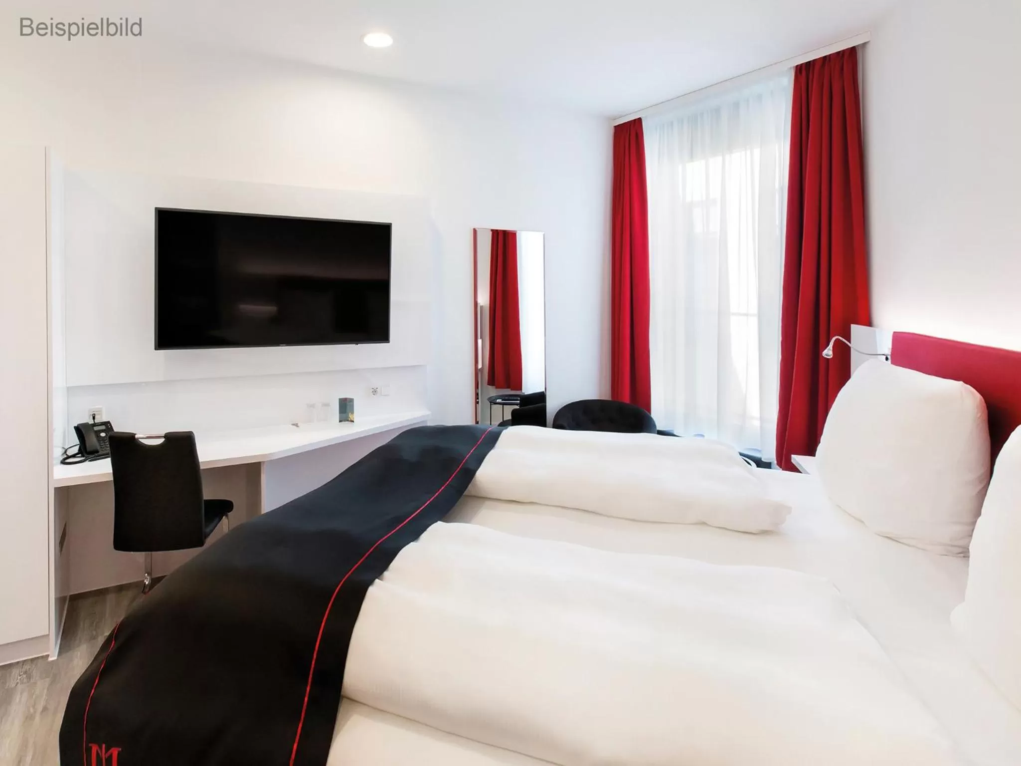 Photo of the whole room, Bed in DORMERO Hotel Darmstadt