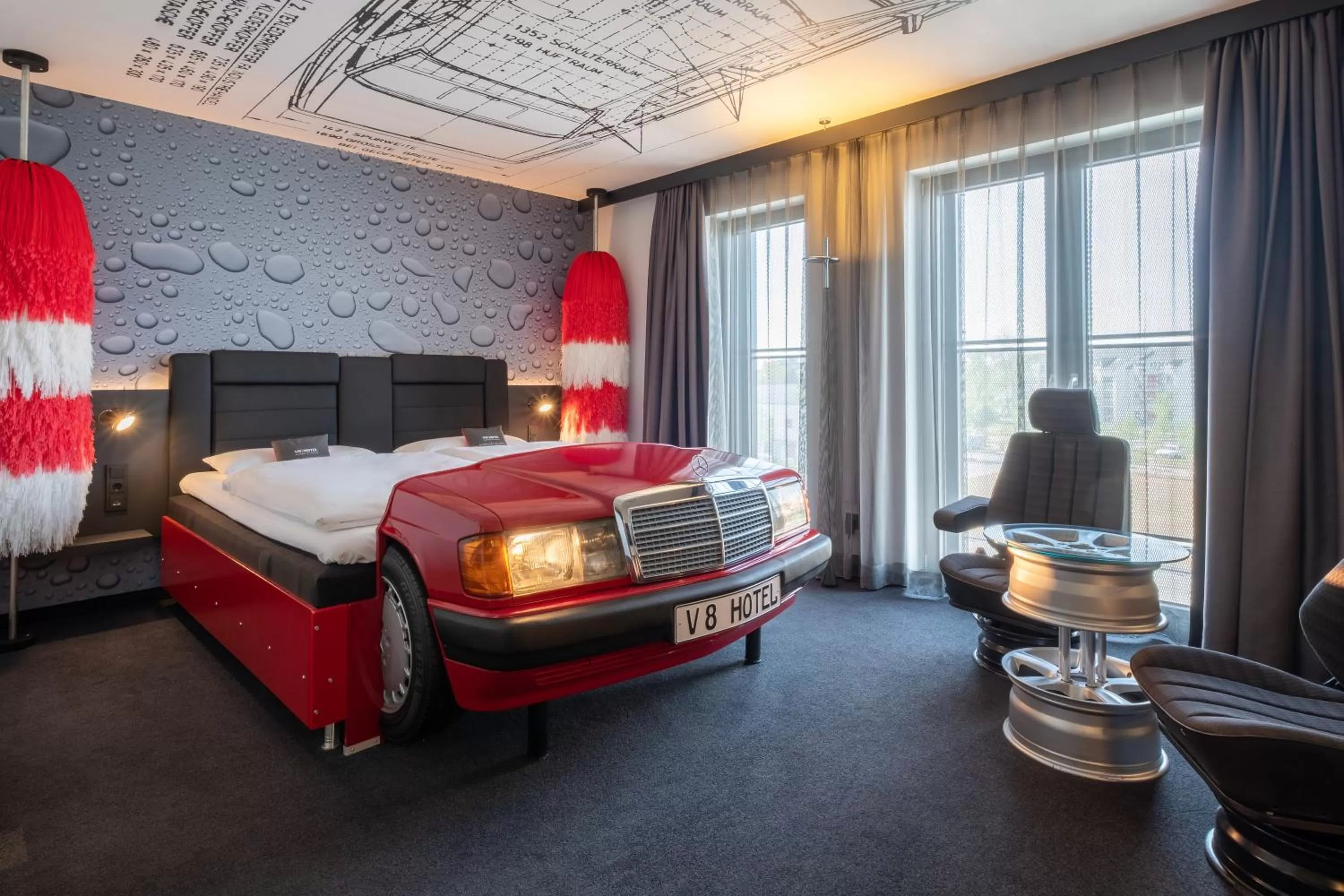 Photo of the whole room, Bed in V8 Hotel Köln at MOTORWORLD