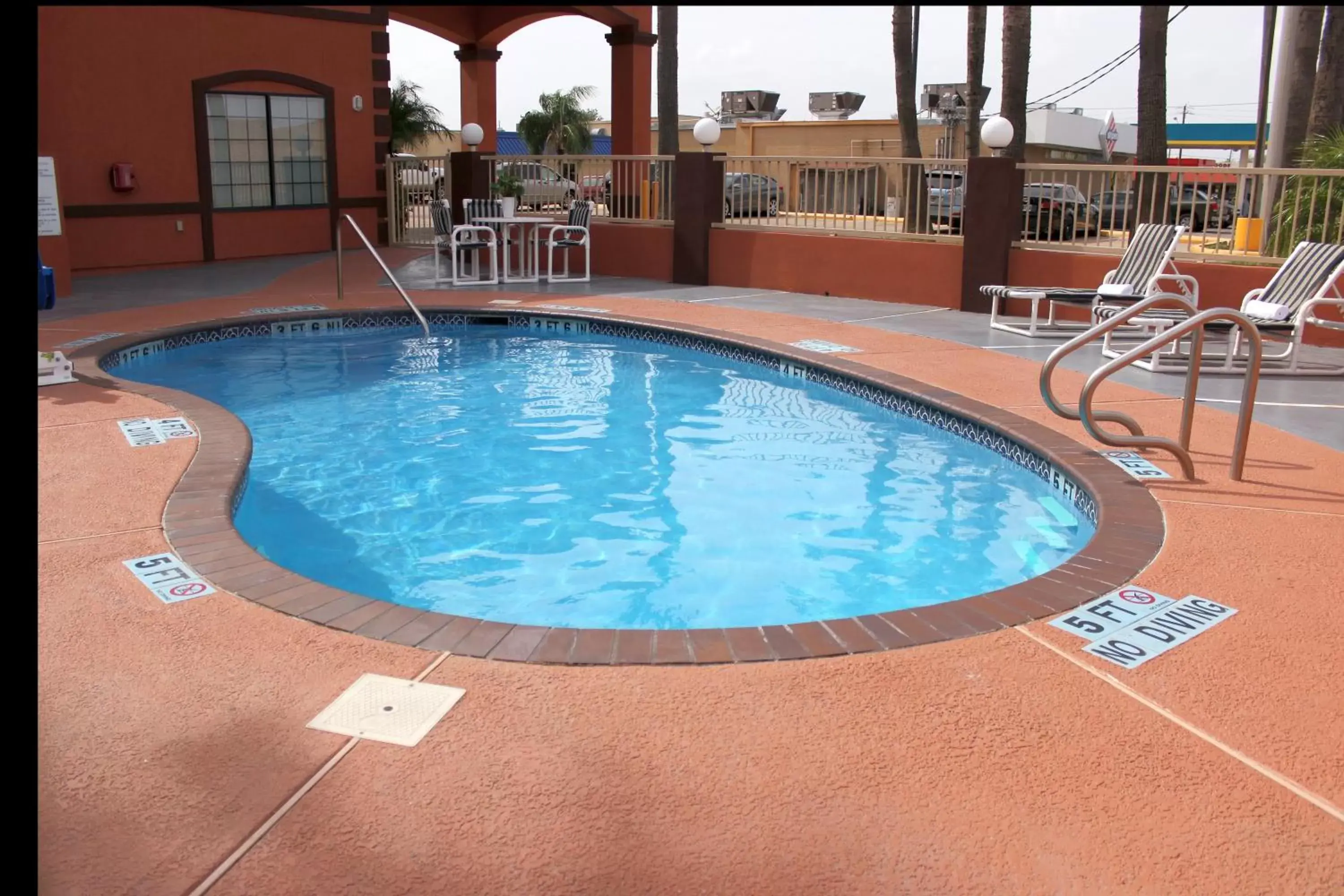 Day, Swimming Pool in Texas Inn & Suites McAllen at La Plaza Mall and Airport