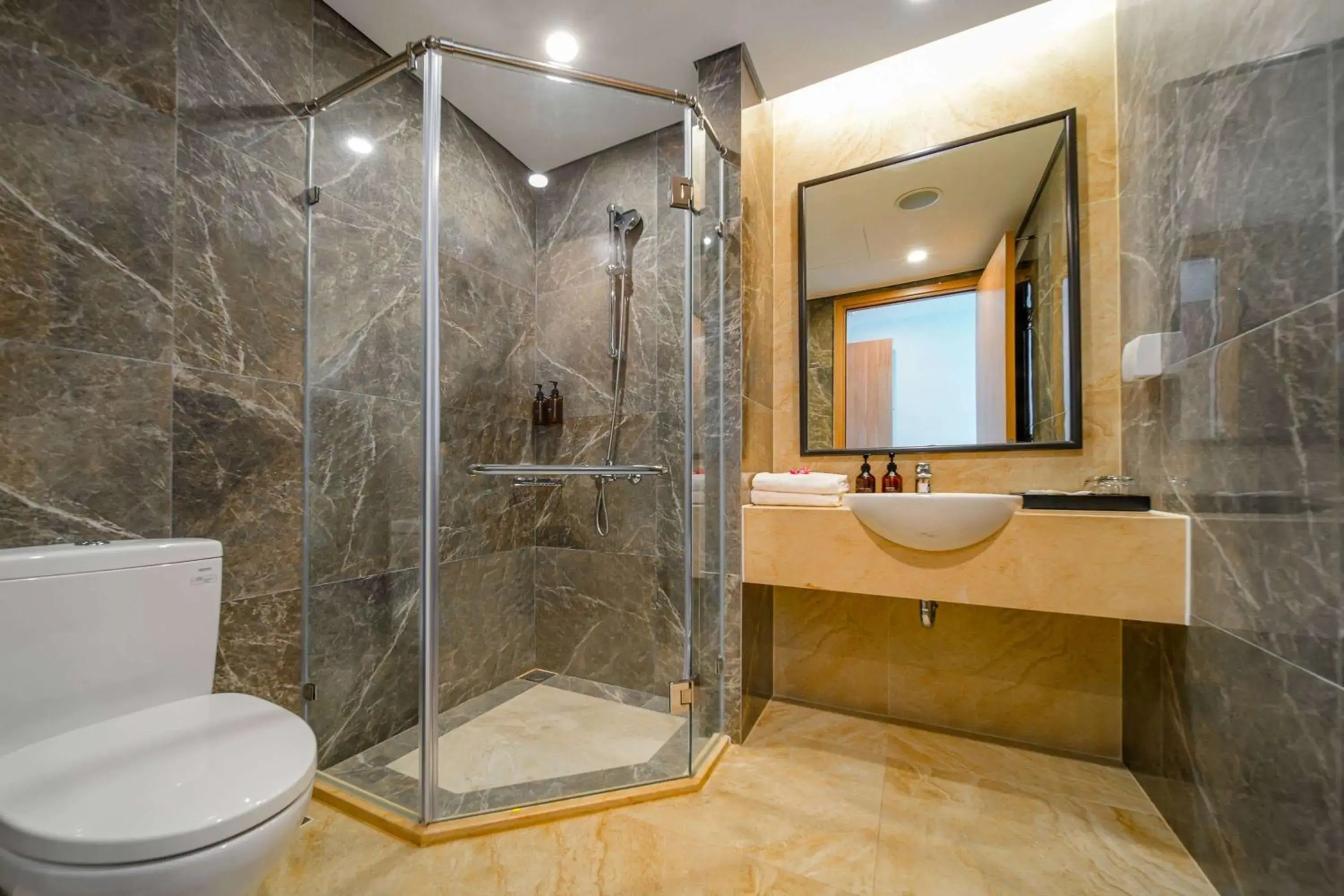 Shower, Bathroom in Wyndham Garden Grandworld Phu Quoc