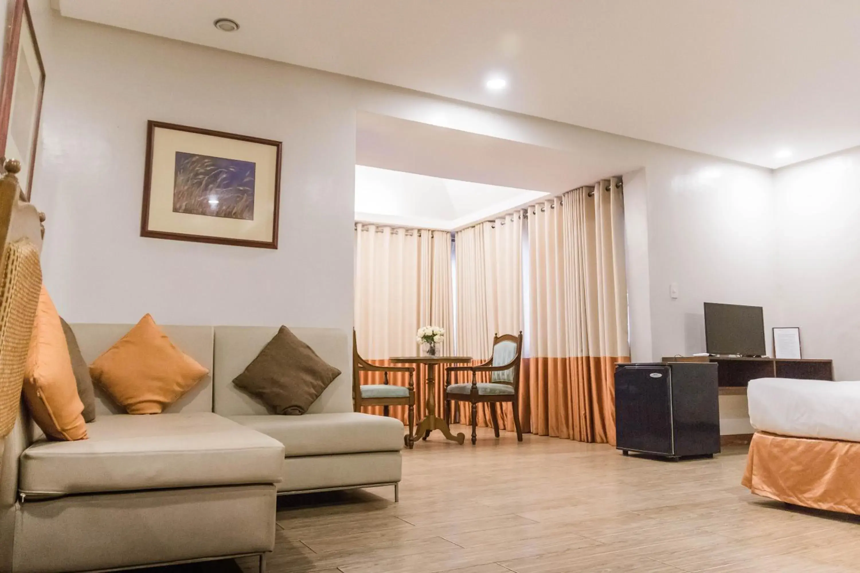 Bedroom, Seating Area in La Fiesta Hotel