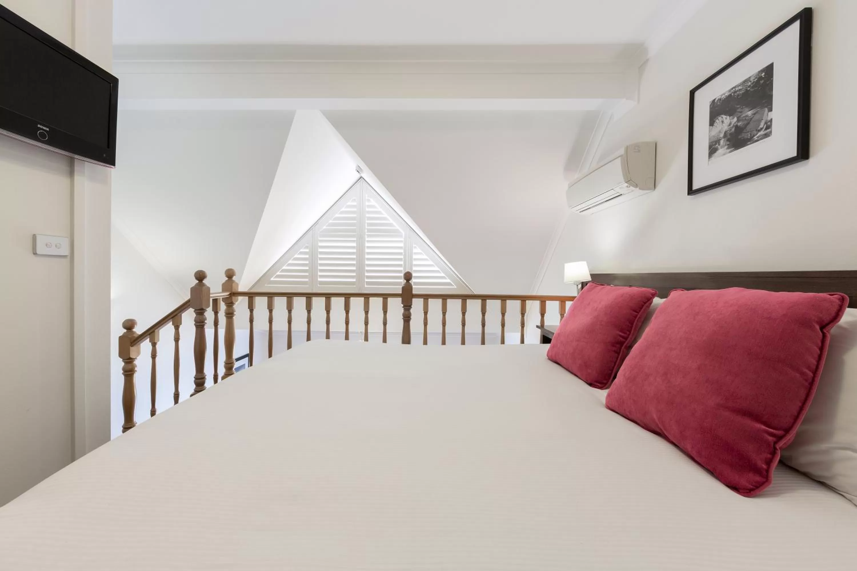 Bed in Mercure Canberra