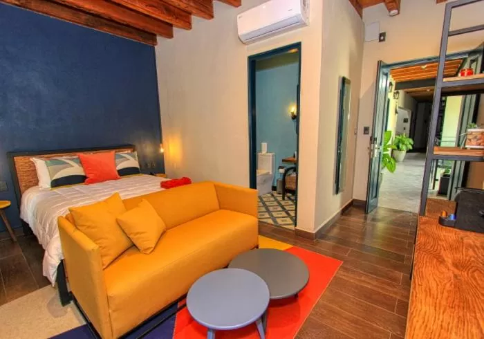 Bed in Antigua Trece Hotel Fusión