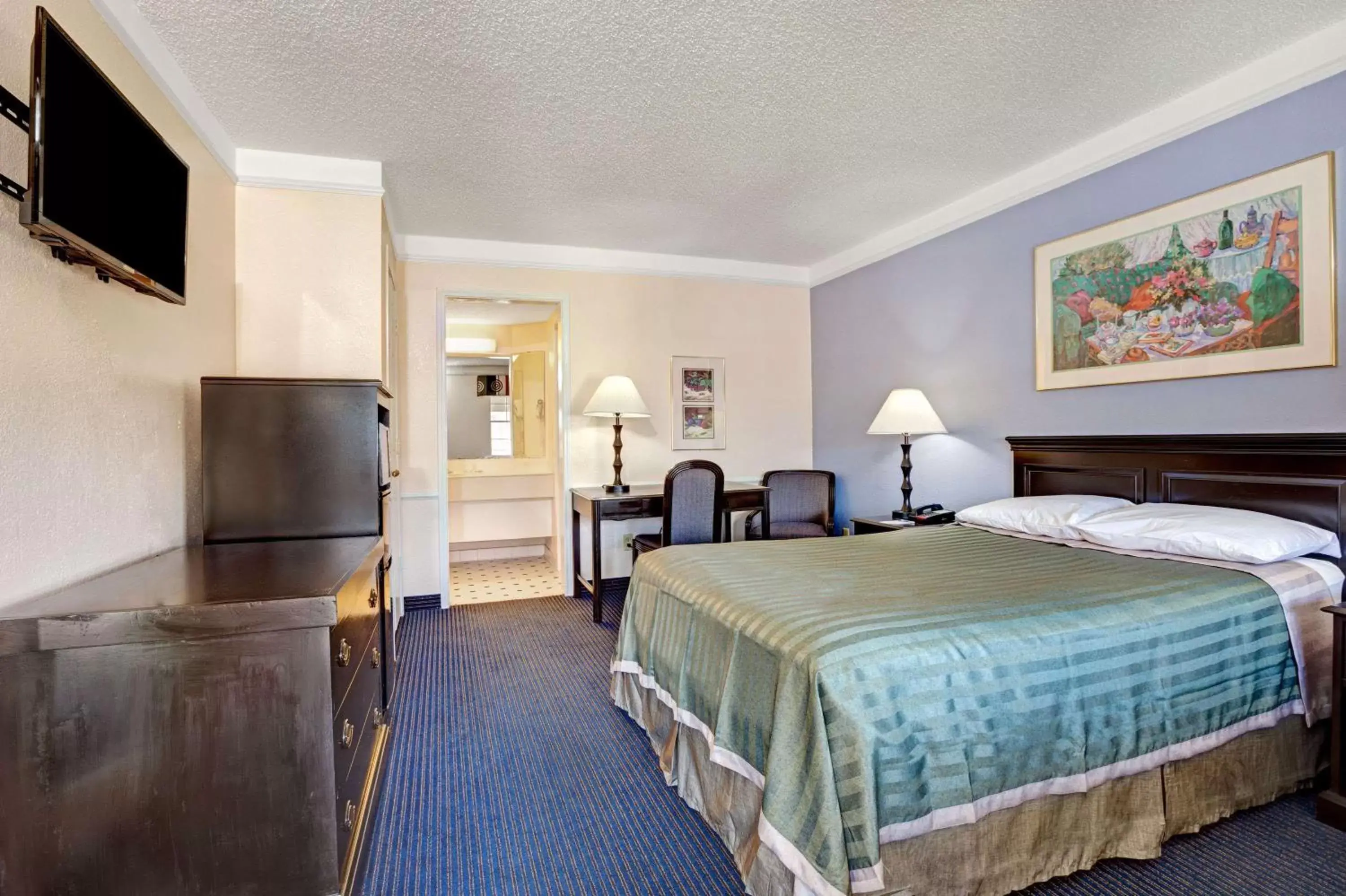 Photo of the whole room in Travelodge by Wyndham North Richland Hills/Dallas/Ft Worth