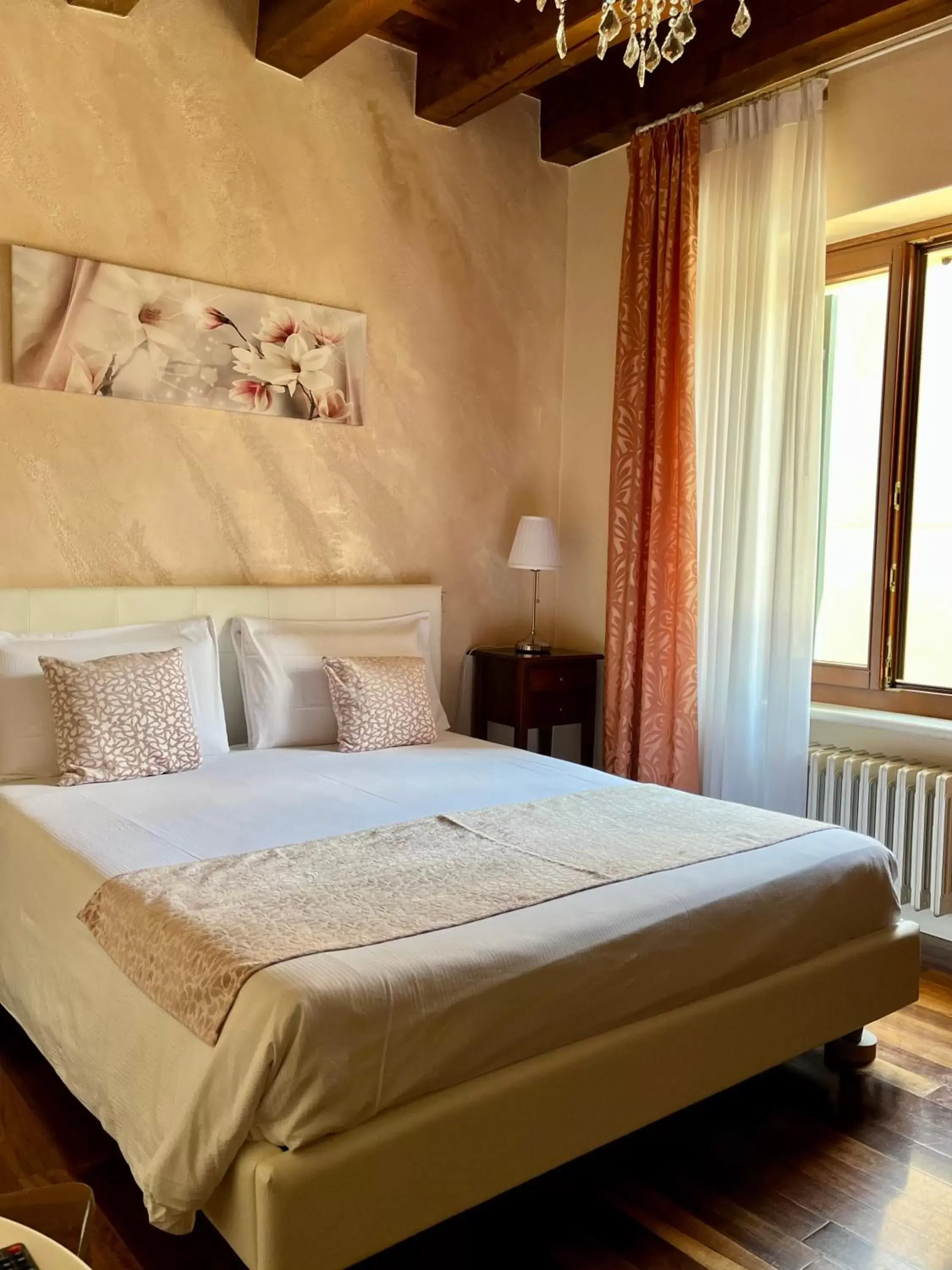 Bed in Relais Ponte Pietra