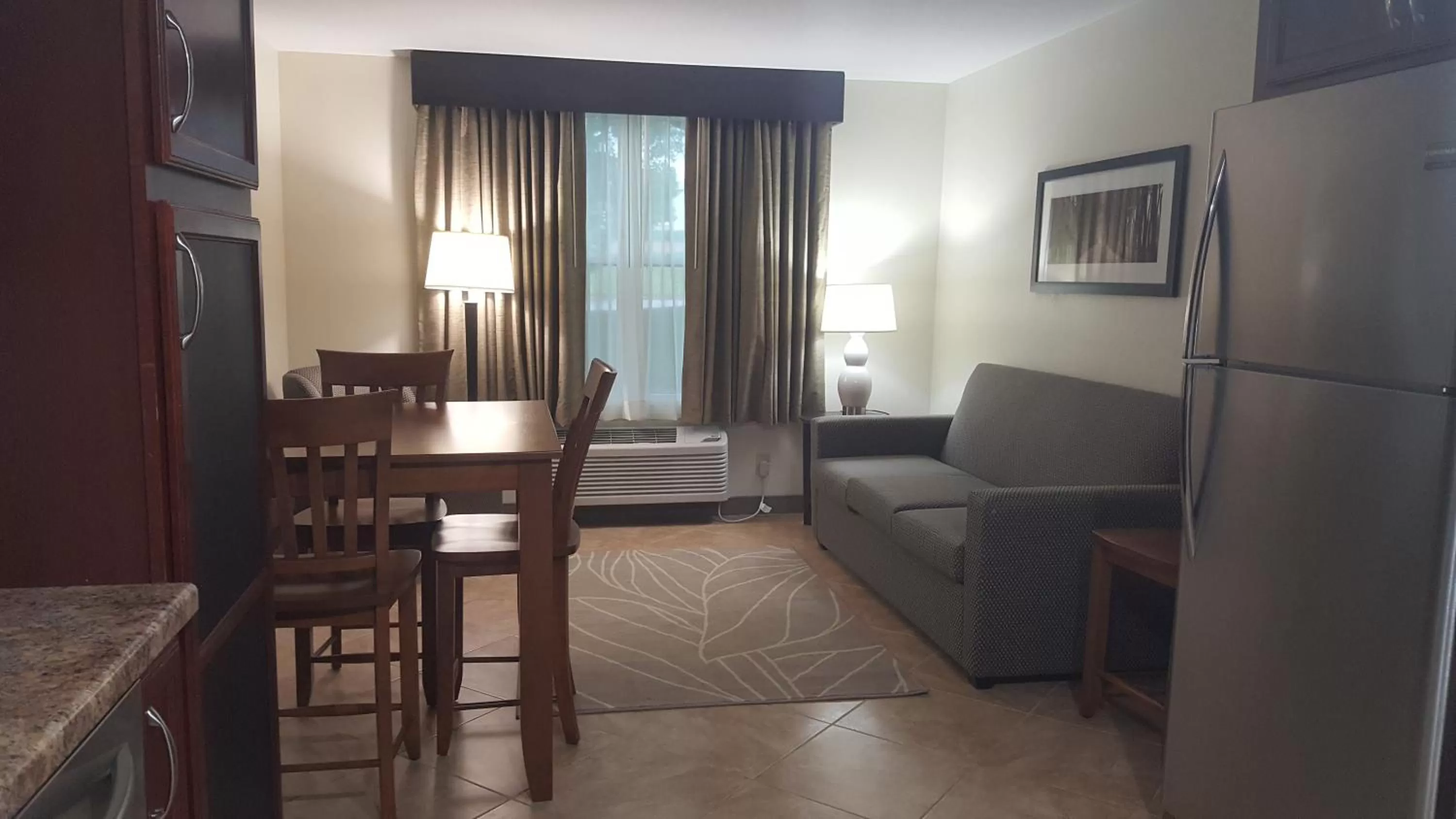 Living room in AmericInn & Suites Burnsville, MN