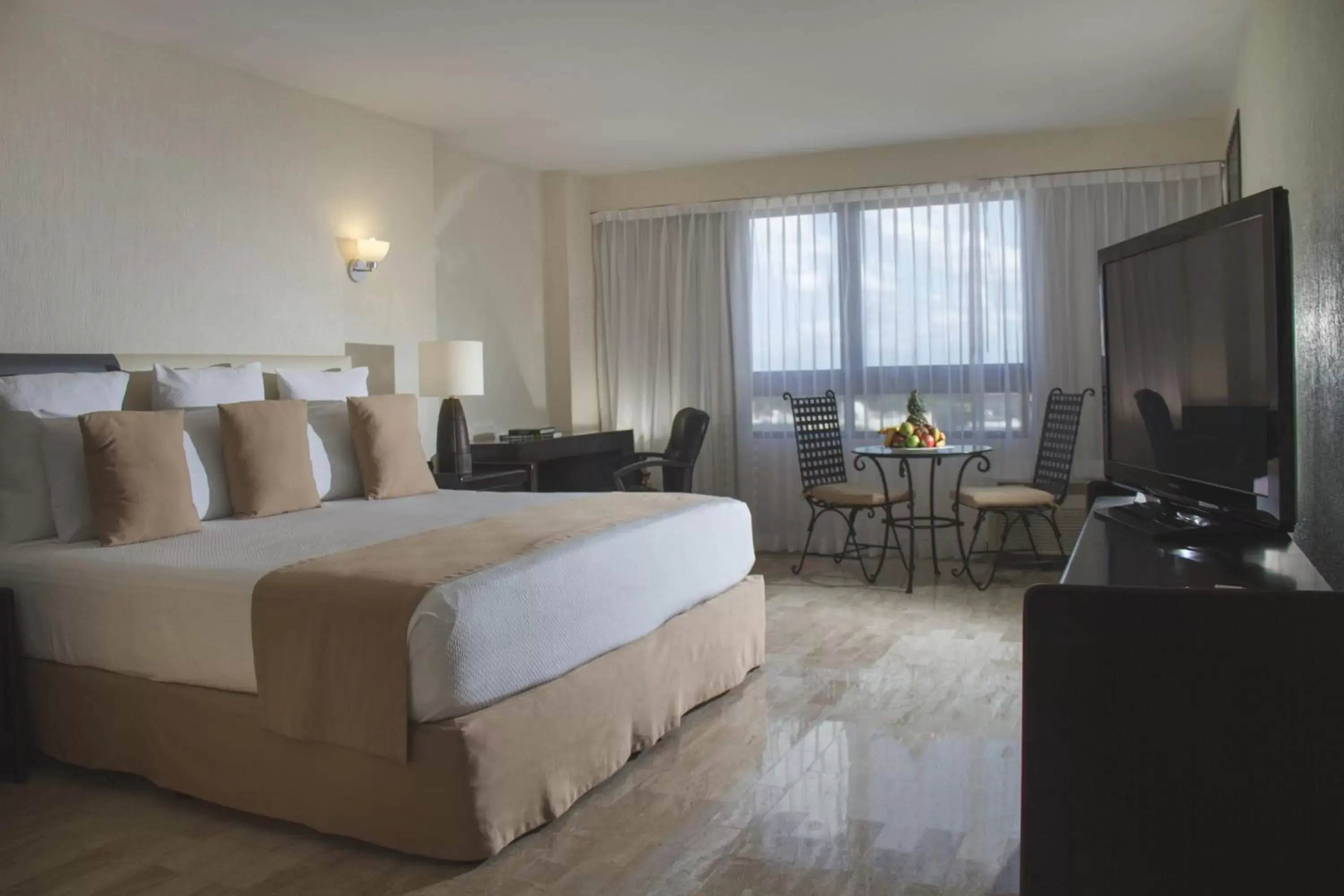 Bedroom, TV/Entertainment Center in Smart Cancun by Oasis