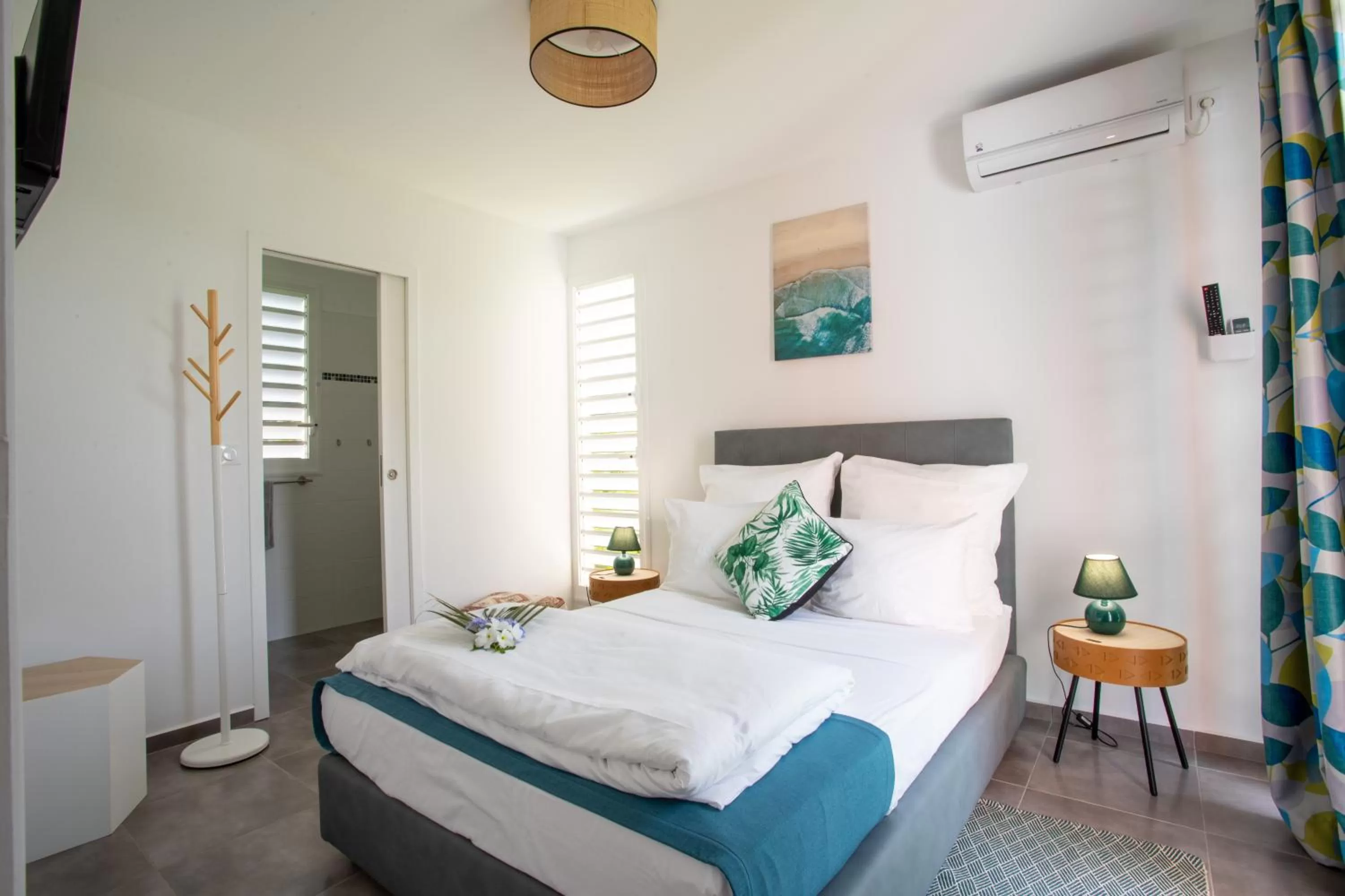 Bed in Hôtel Guadeloupe Palm Suites