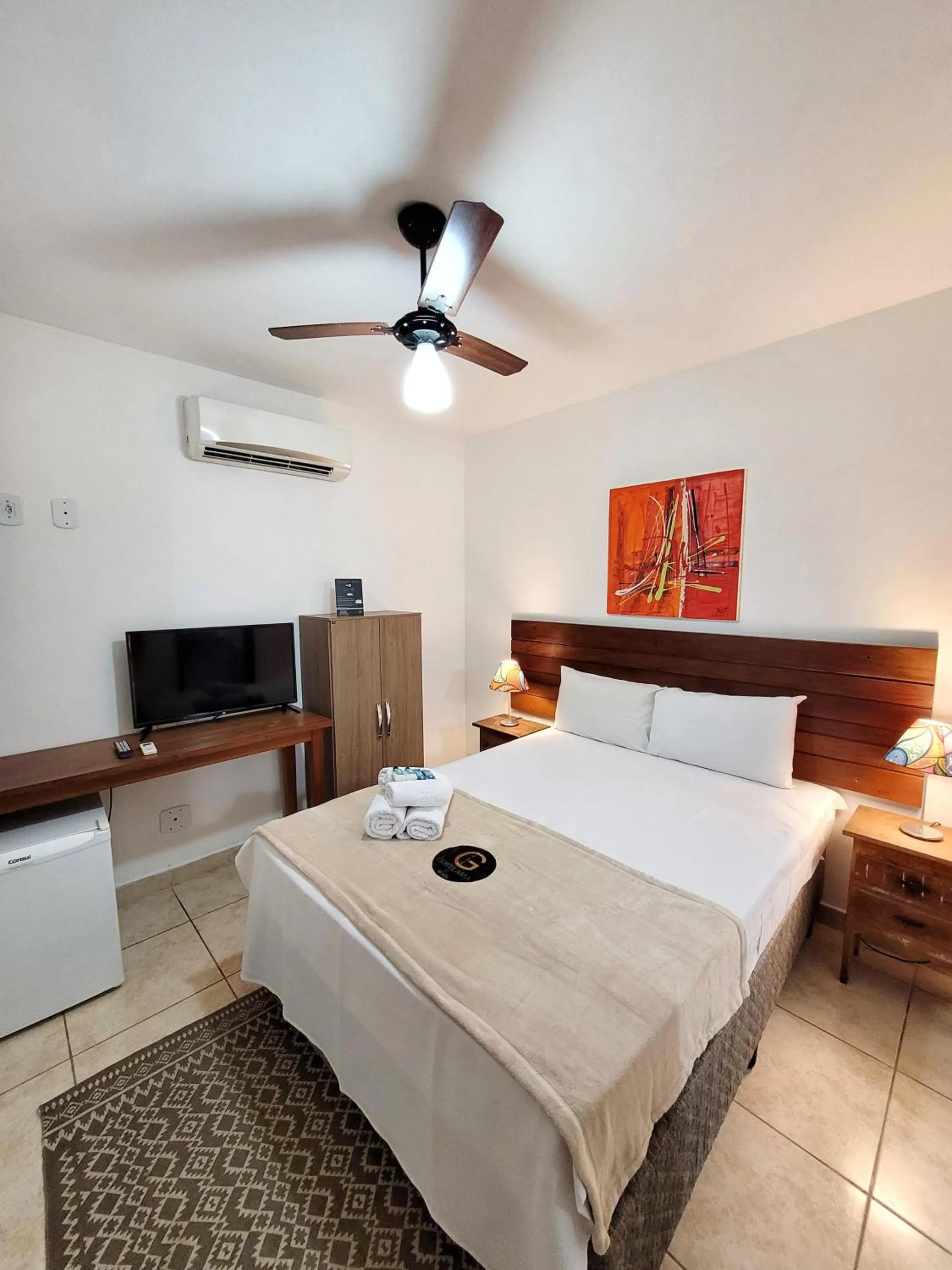 Photo of the whole room, Bed in Pousada Casa Centro Búzios