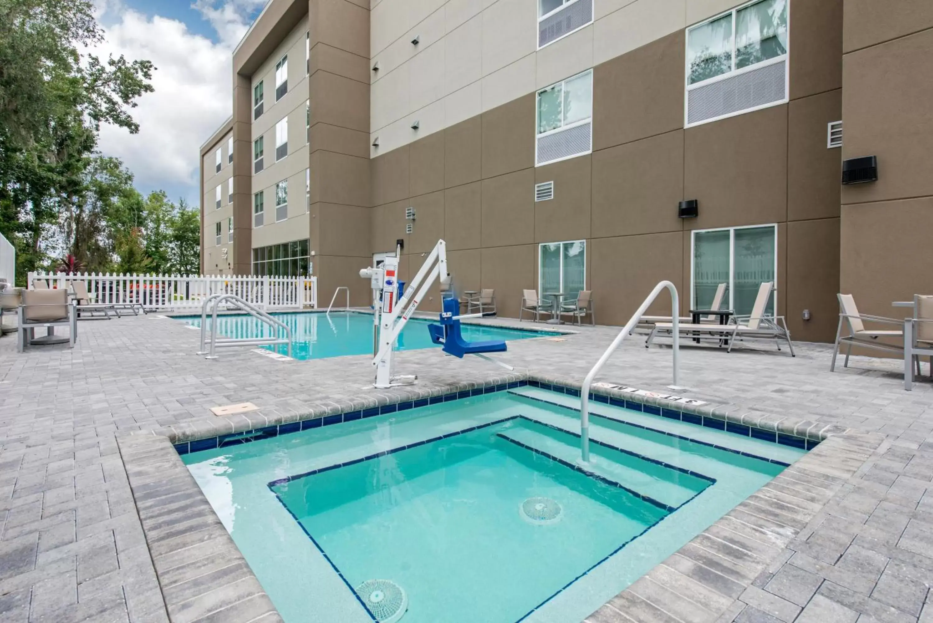 Swimming Pool in Holiday Inn Express & Suites Alachua - Gainesville Area, an IHG Hotel