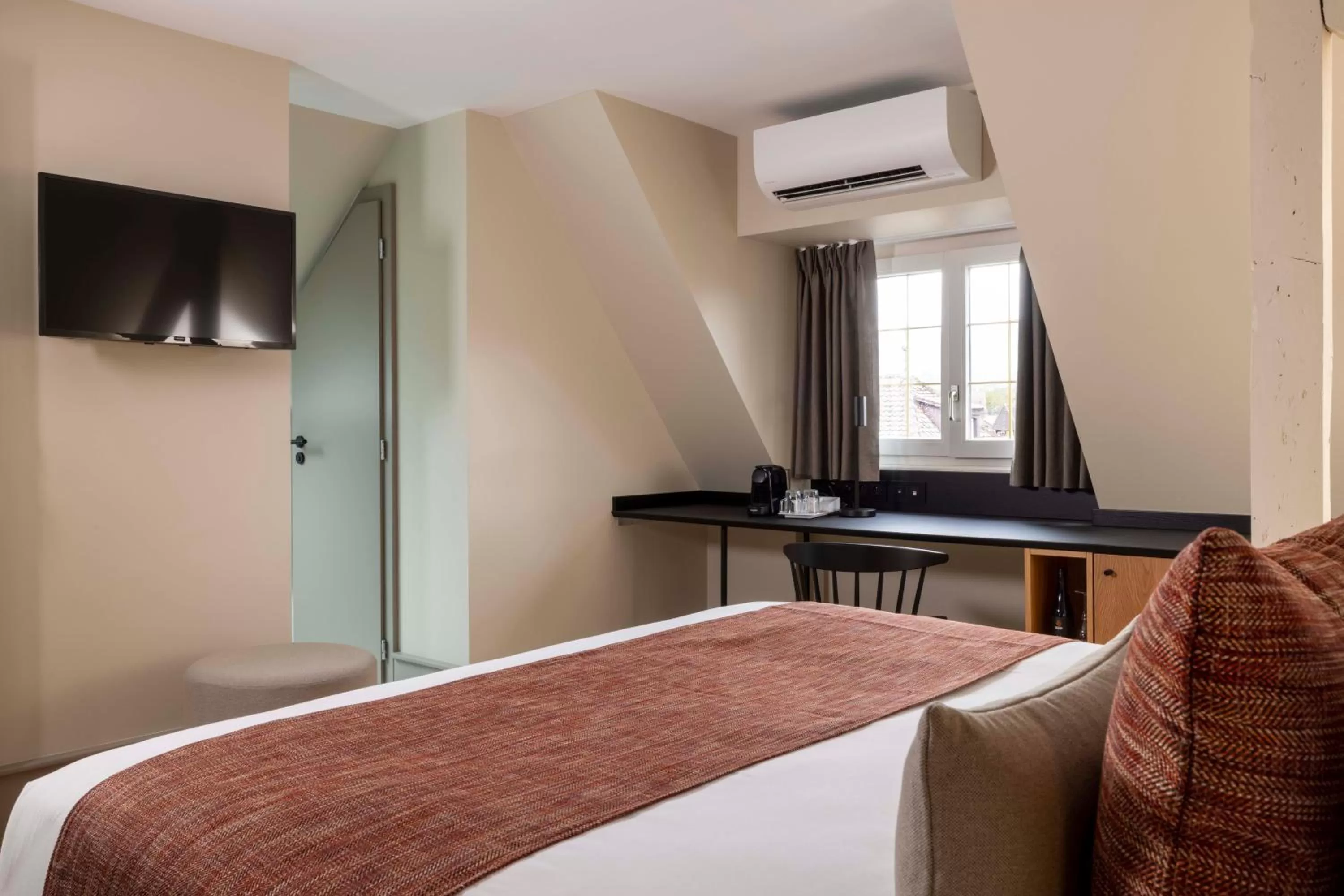 Bed in Hotel La Diligence