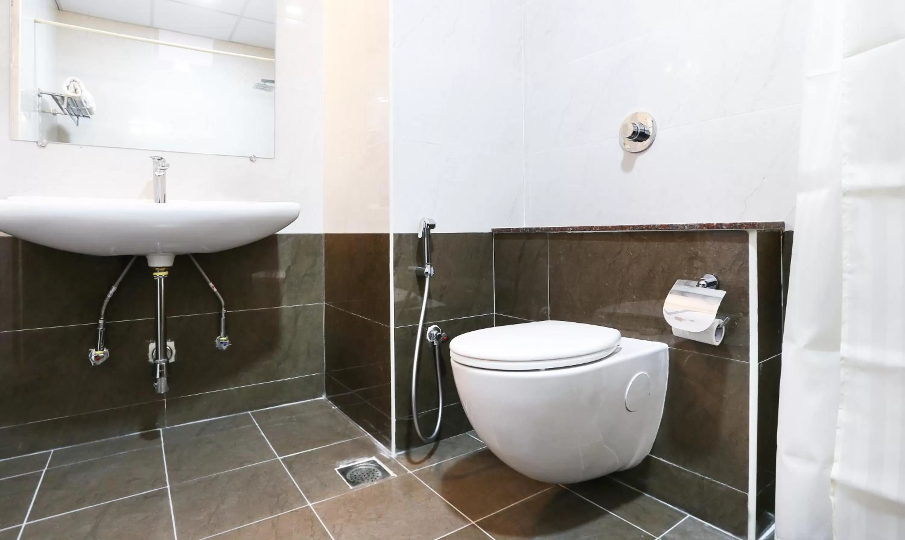 Bathroom in Treebo Premium Akshaya Mahal Inn