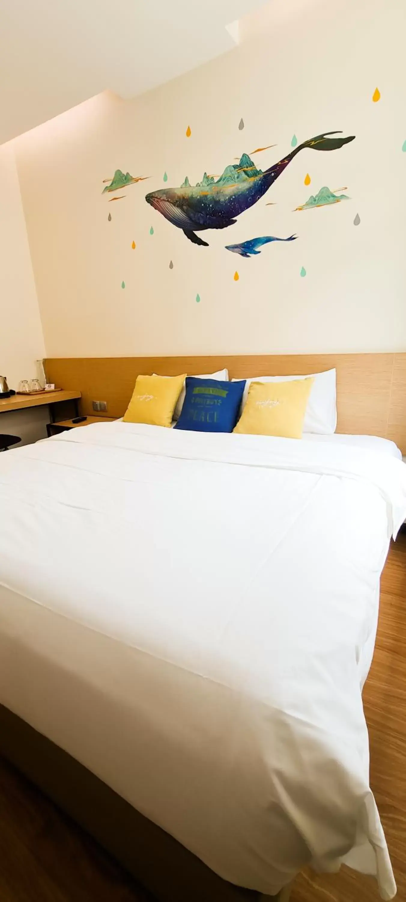 Bed in Qlio Hotel
