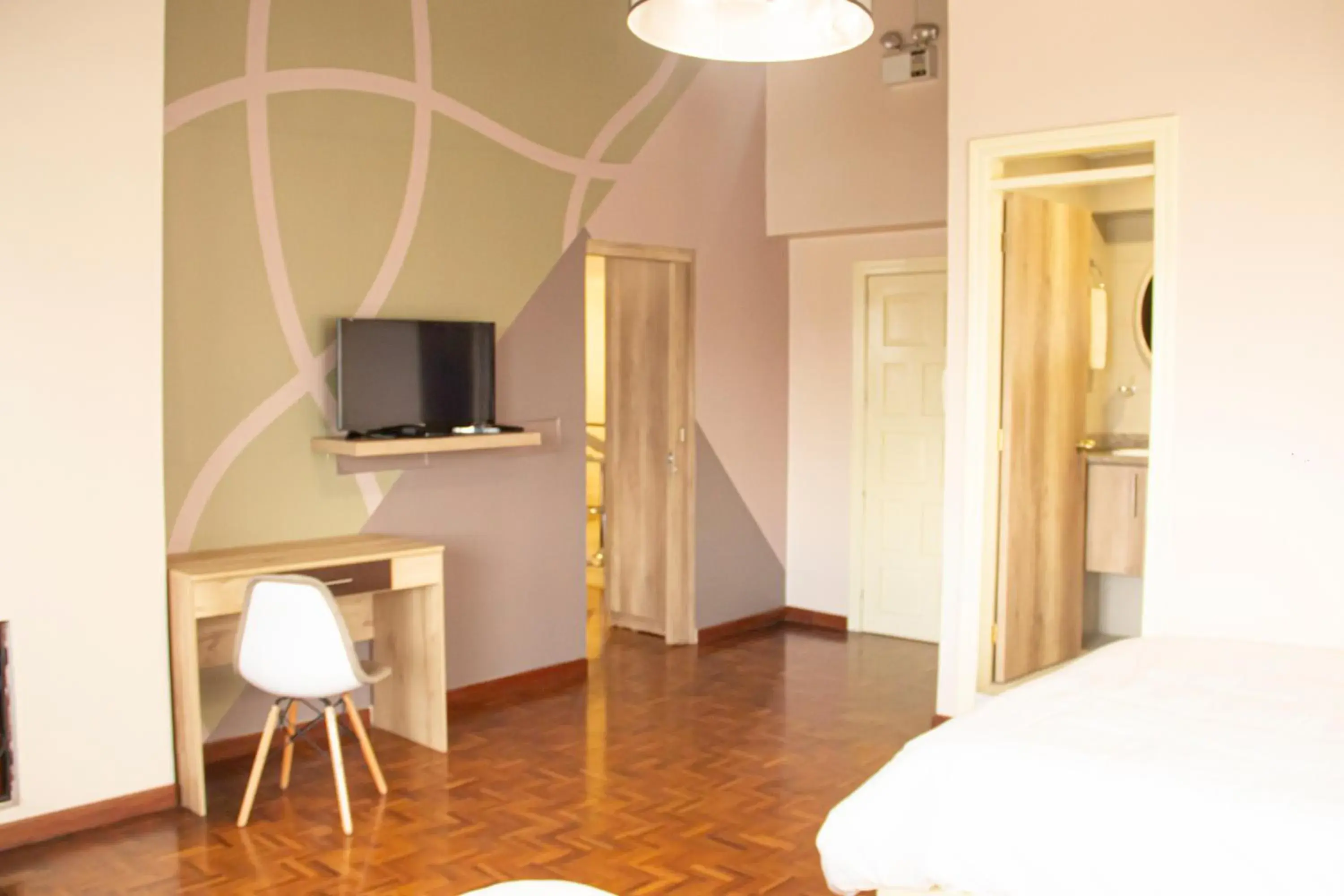 Bedroom, TV/Entertainment Center in Hotel Sandmelis
