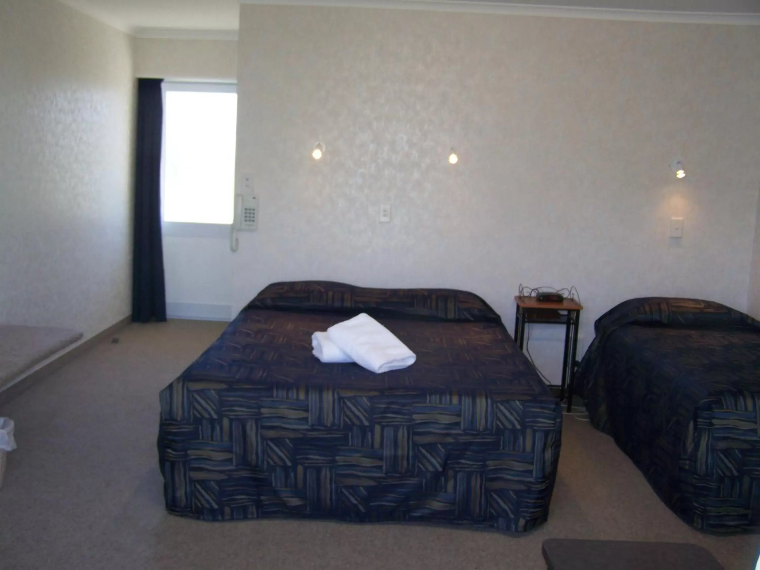 Bed in Parklands Motel