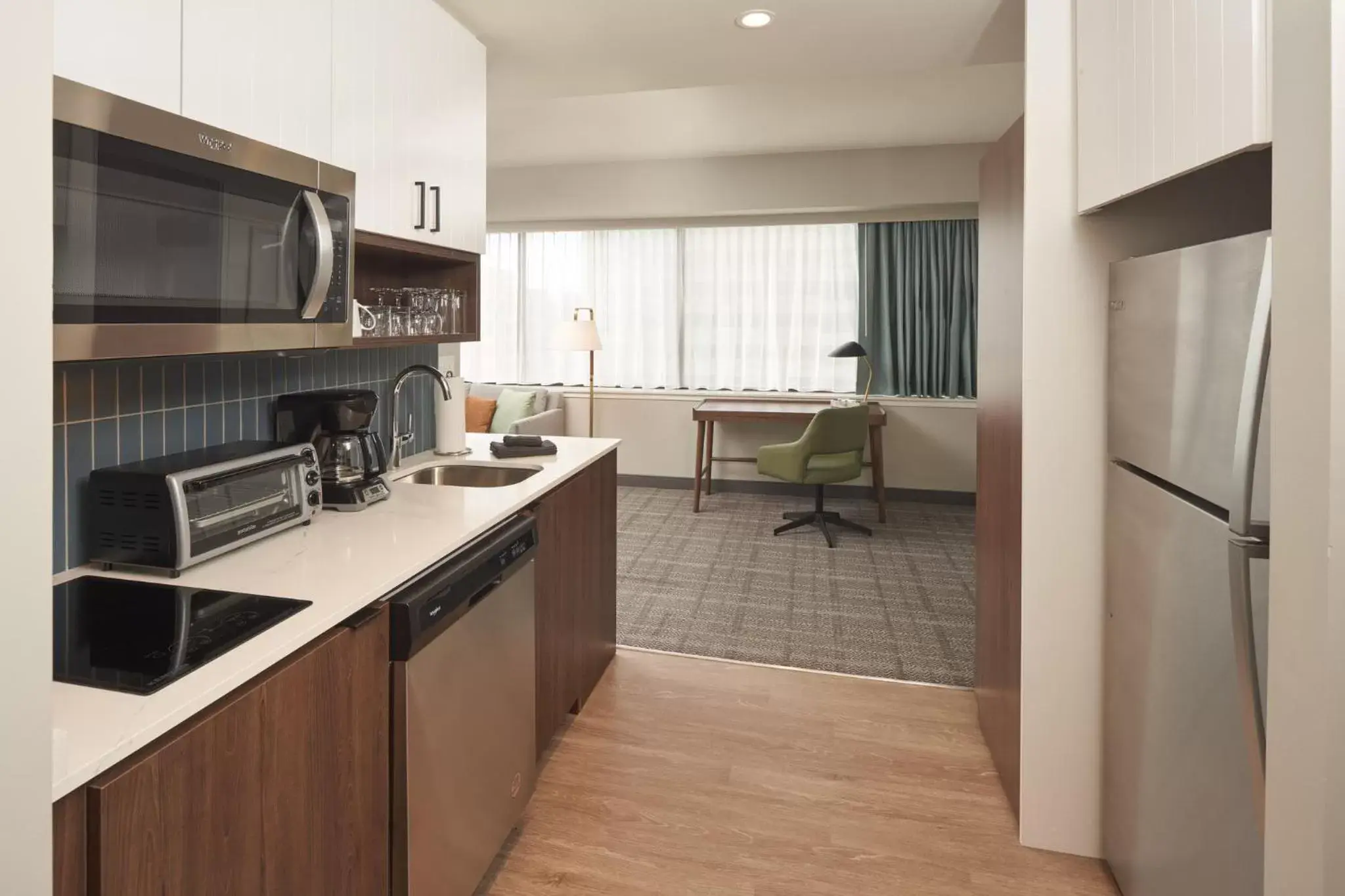 Photo of the whole room, Kitchen/Kitchenette in Staybridge Suites Wilmington Downtown, an IHG Hotel