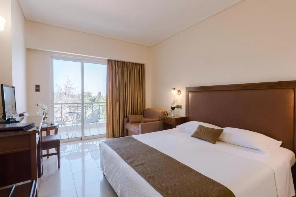 Photo of the whole room, Bed in Akti Taygetos - Conference Resort