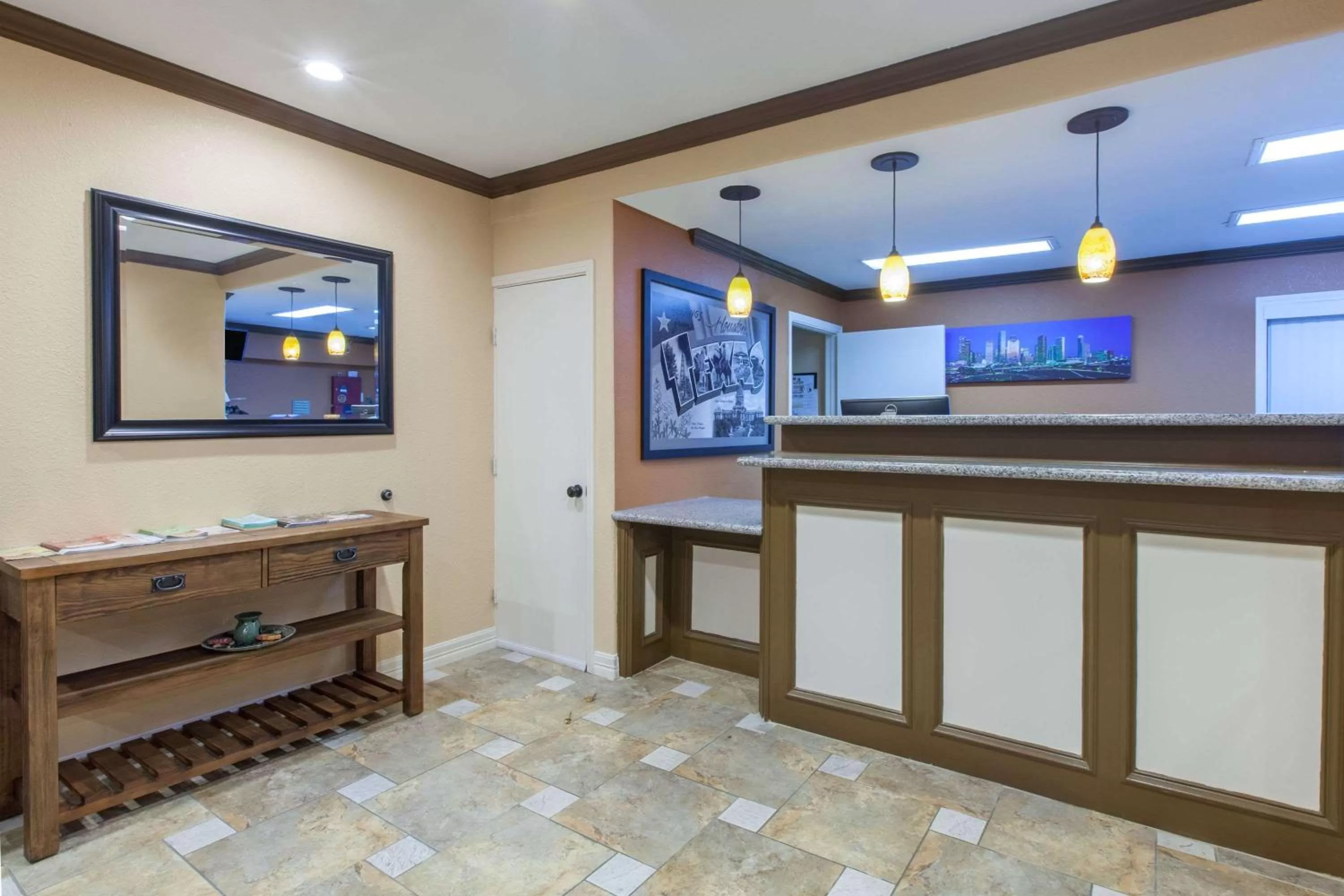 Lobby or reception in Super 8 by Wyndham Willowbrook Houston