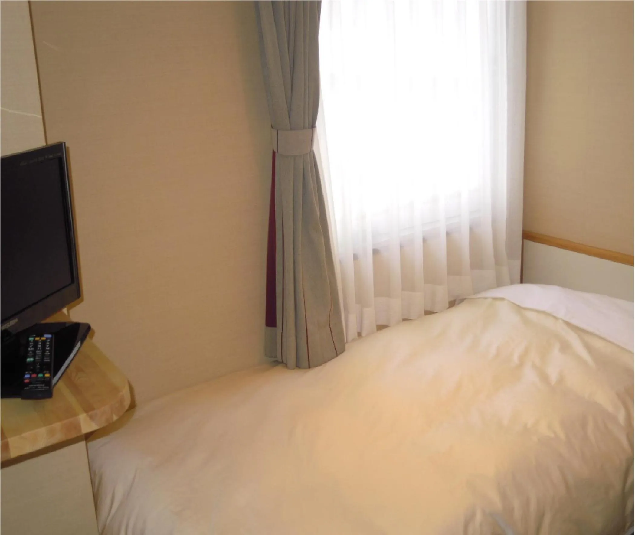 Bed in Niigata Park Hotel