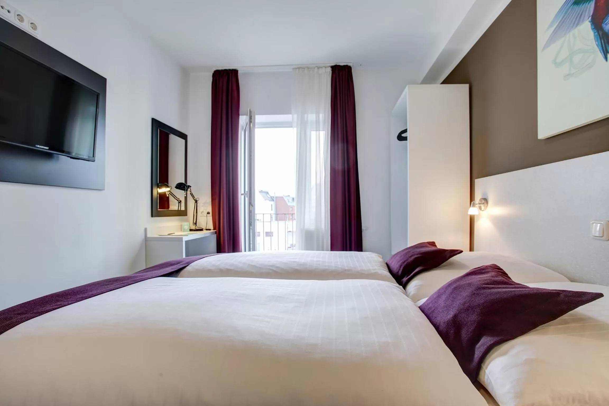 Balcony/Terrace, Bed in Hotel West