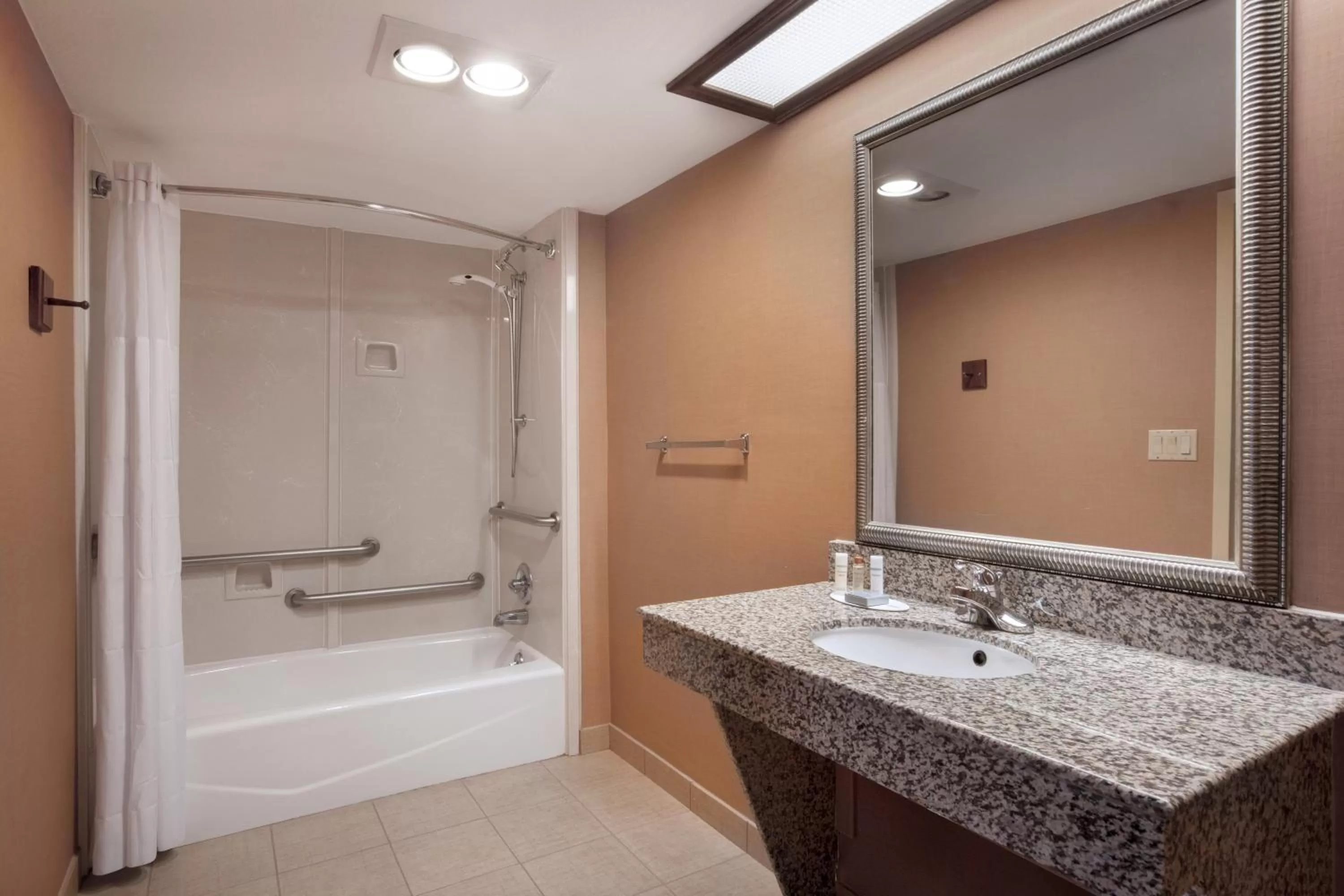 Bathroom in Days Inn & Suites by Wyndham Tyler