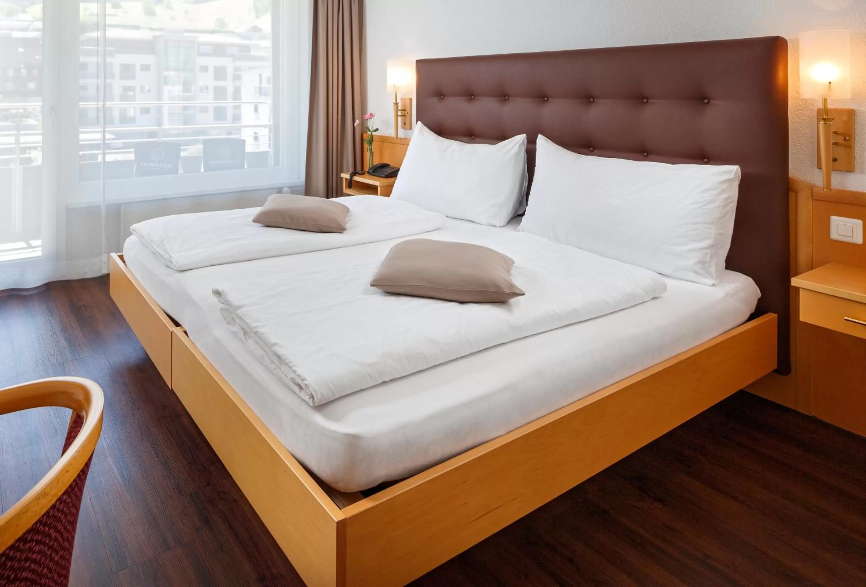 Photo of the whole room, Bed in Seerausch Swiss Quality Hotel