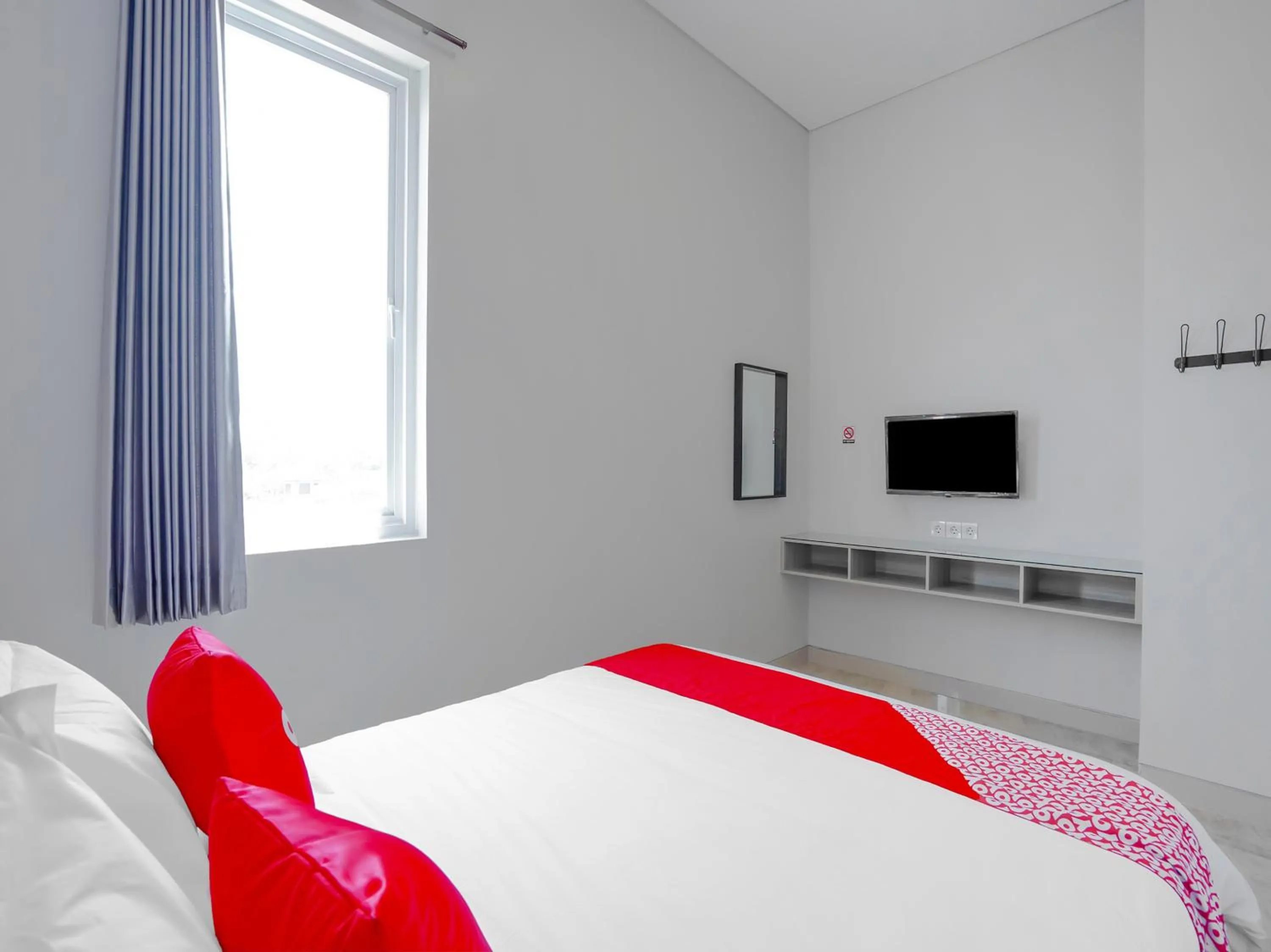 Bedroom in Capital O 90336 Olive Guest House