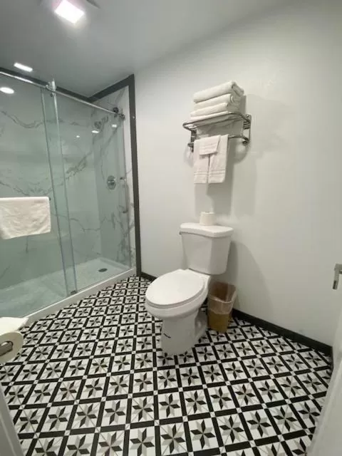 Bathroom in Super 8 by Wyndham Oceanside Downtown