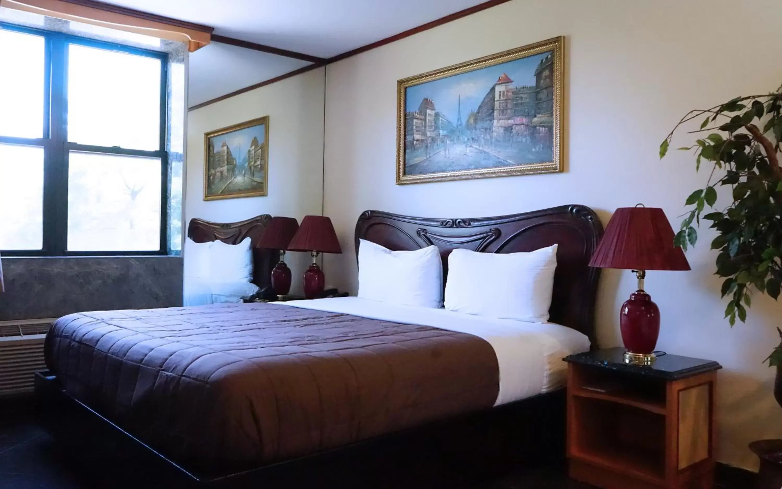 Bedroom in Paris Suites Hotel