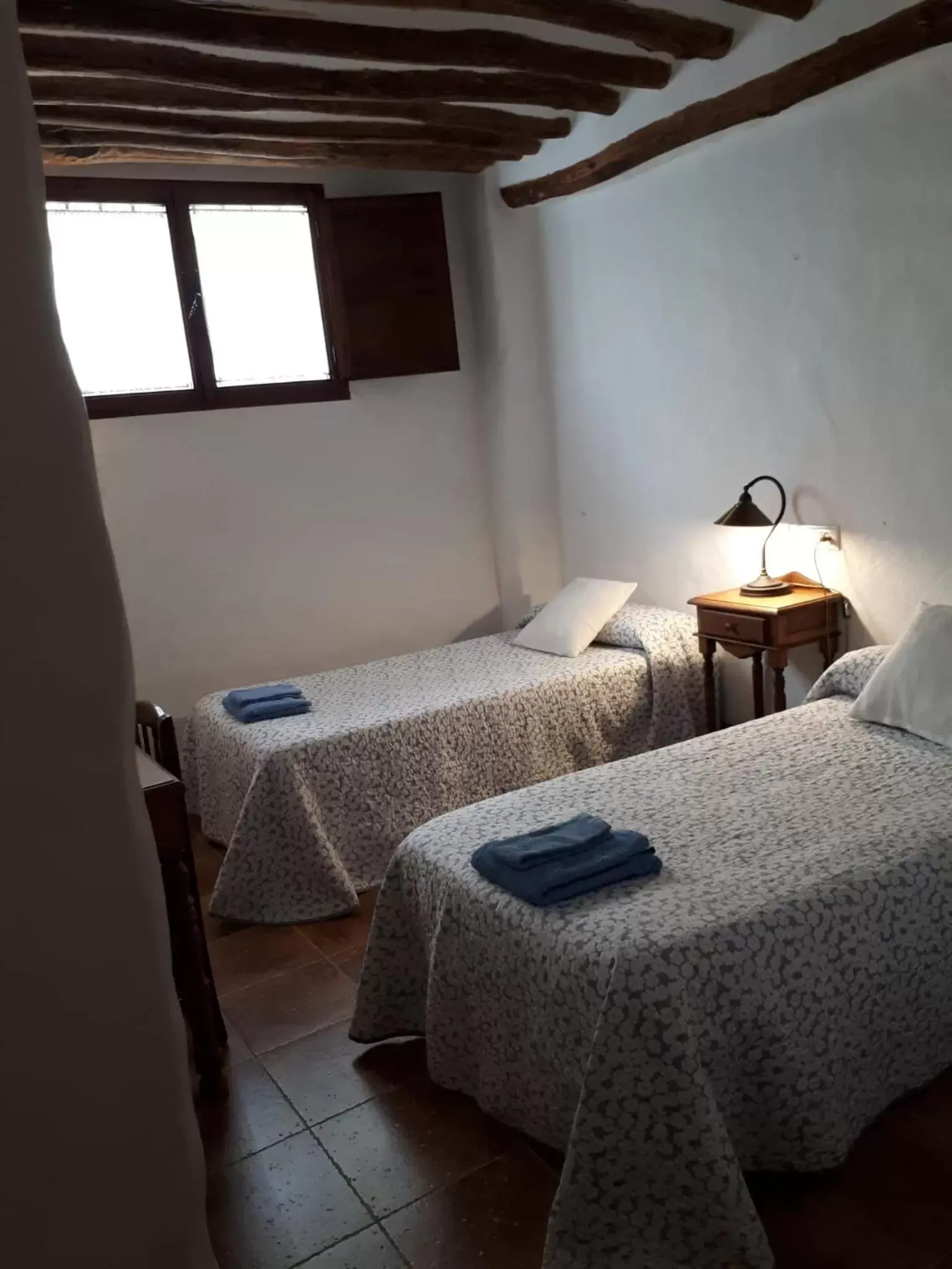 towels, Bed in La Posada Amena