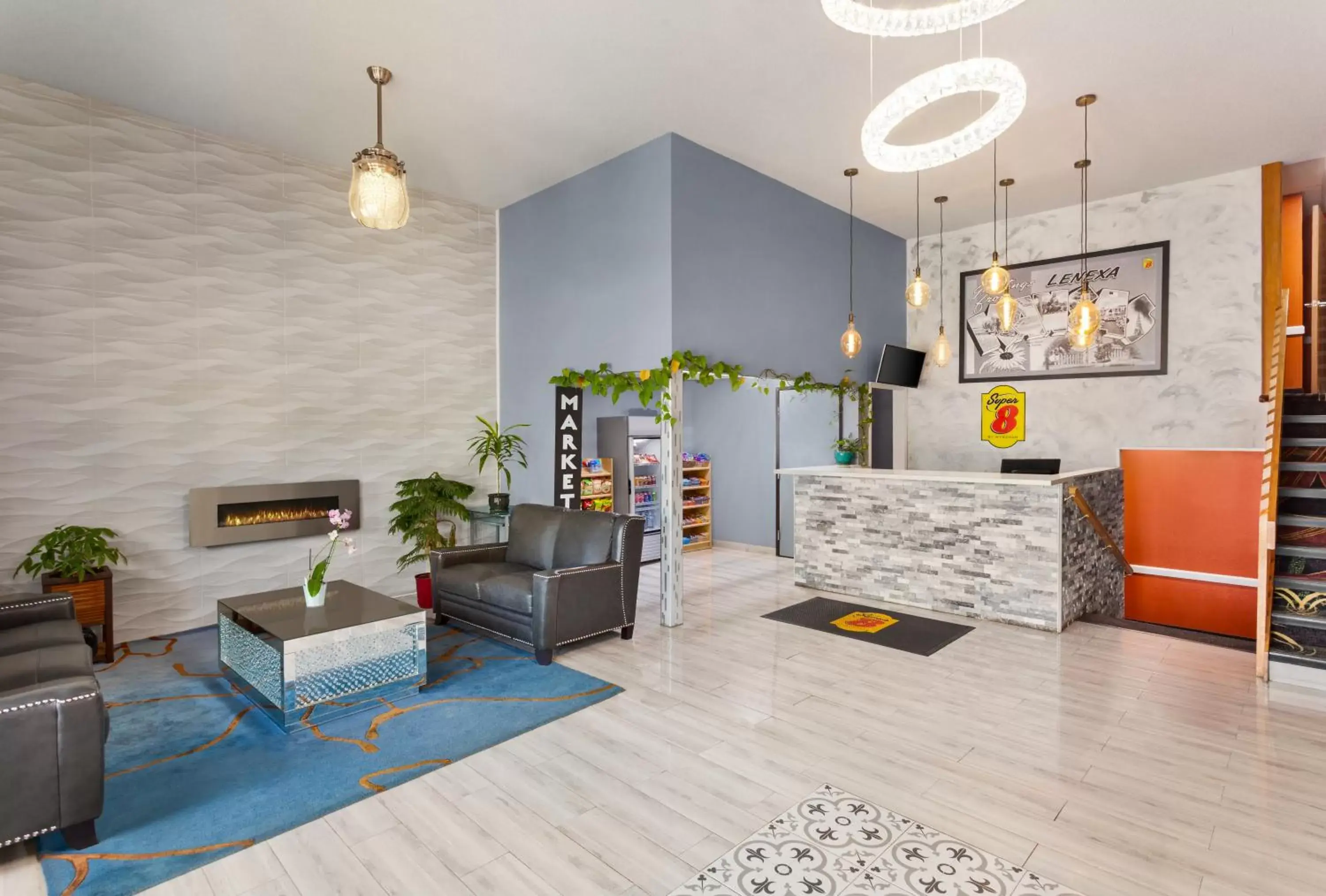 Lobby or reception in Super 8 by Wyndham Lenexa Overland Park Area/Mall Area Lobby or reception in Super 8 by Wyndham Lenexa Overland Park Area/Mall Area