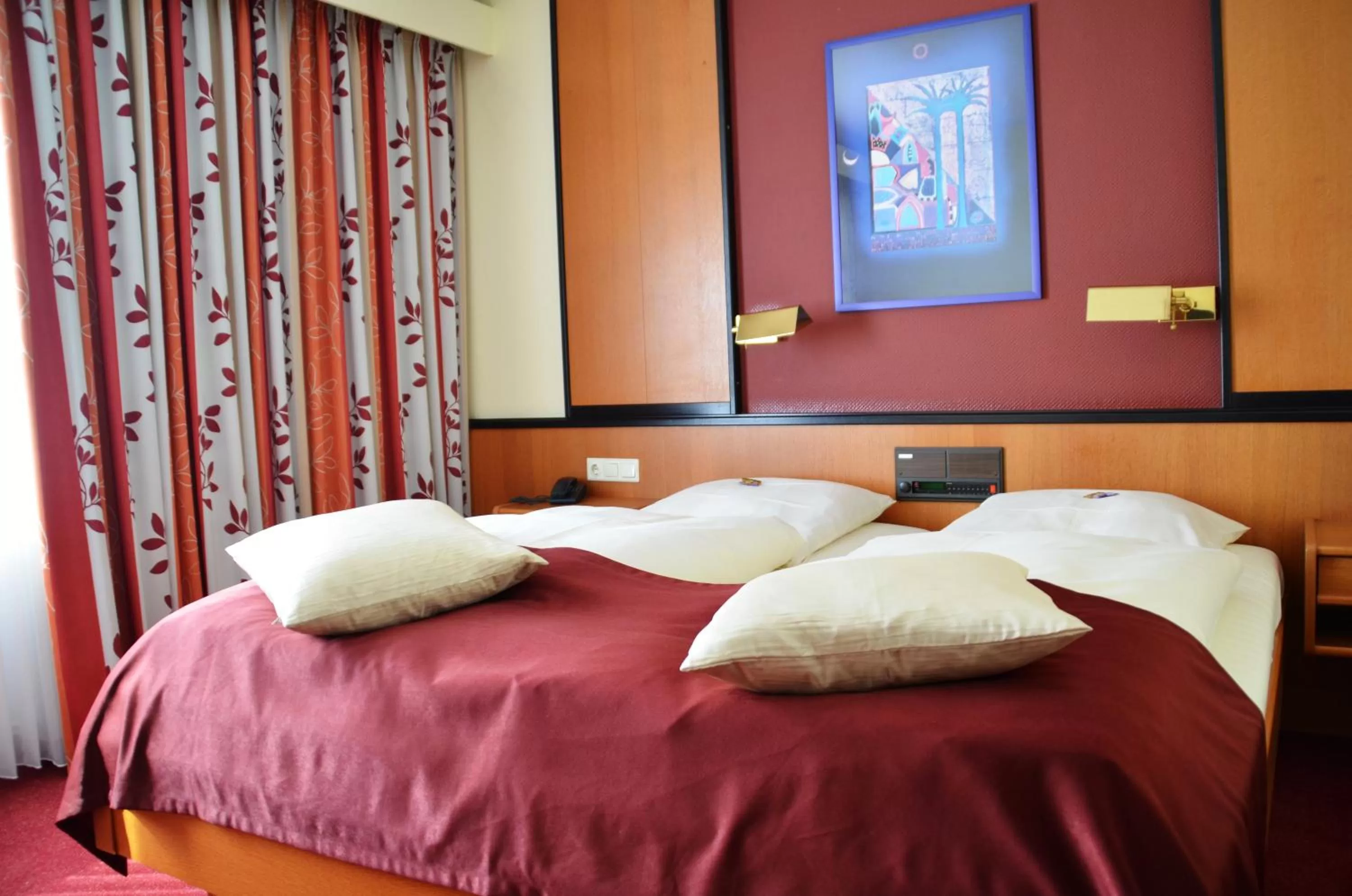 Bed in Hotel Exquisit