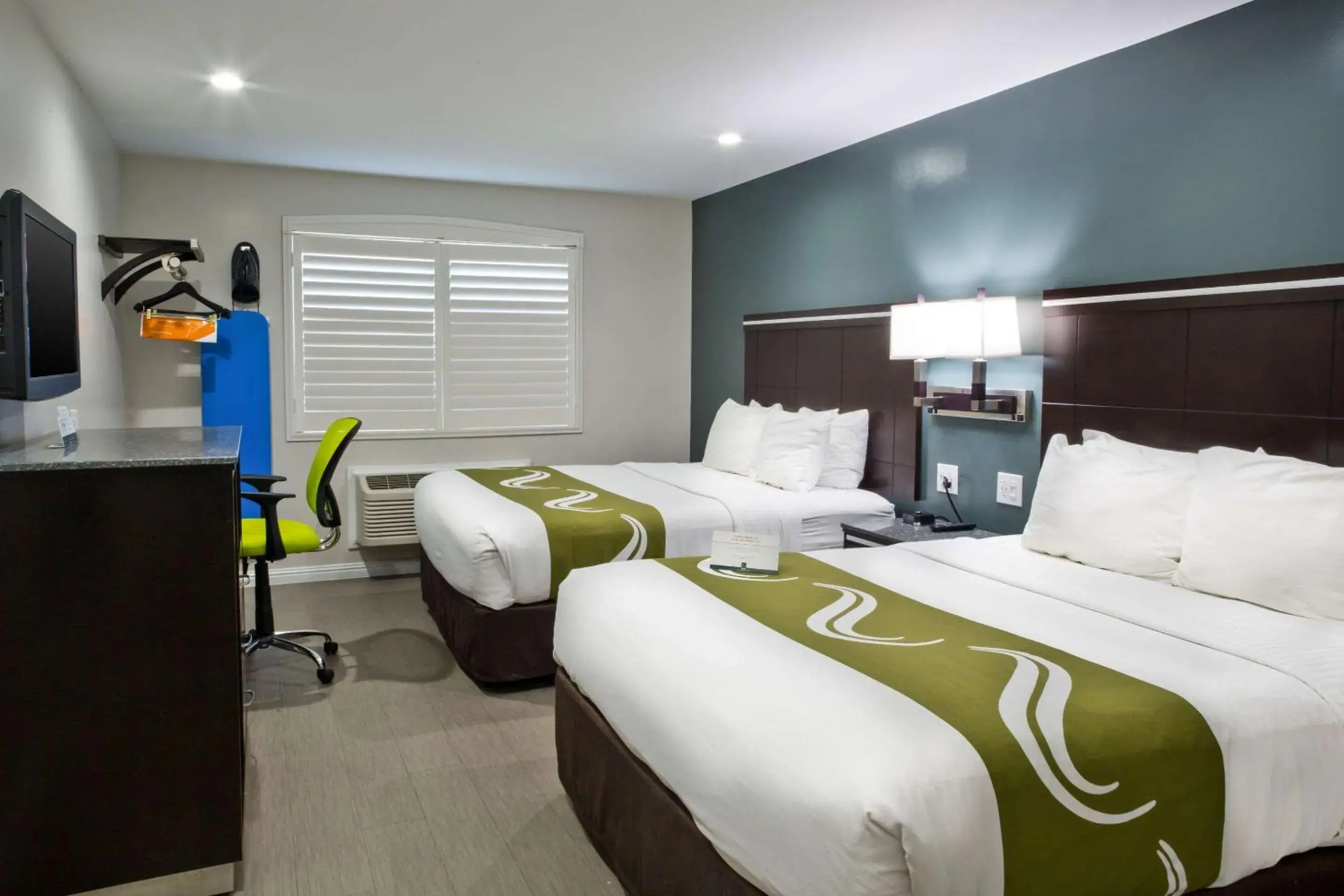 Photo of the whole room, Bed in Bay Area Inn & Suites Photo of the whole room, Bed in Bay Area Inn & Suites