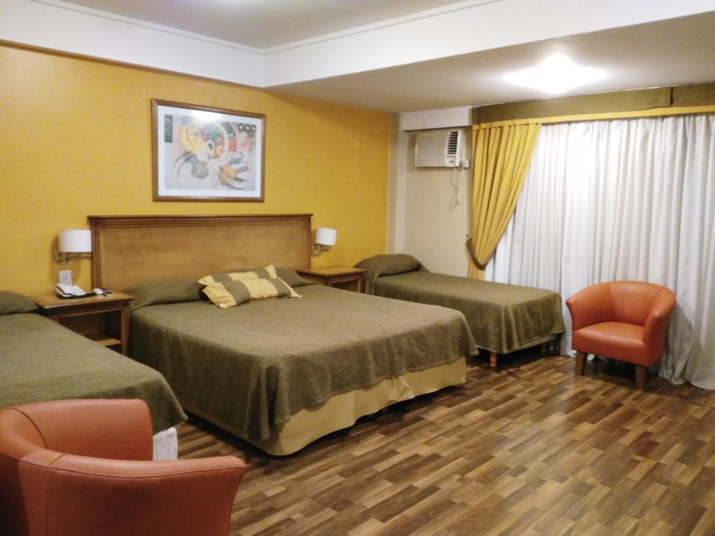 Bedroom, Bed in Tritone Hotel